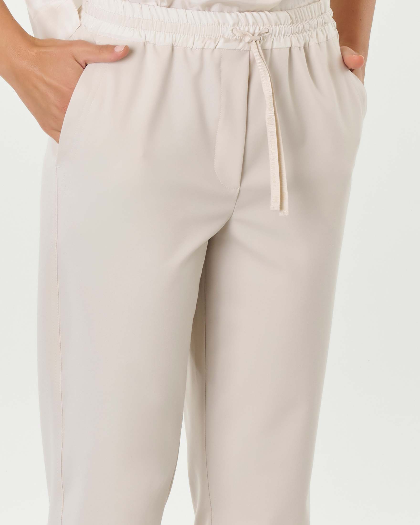 Pantaloni color gesso in tela di misto viscosa con elastico e coulisse inseriti in vita Linea MONOCHROME image