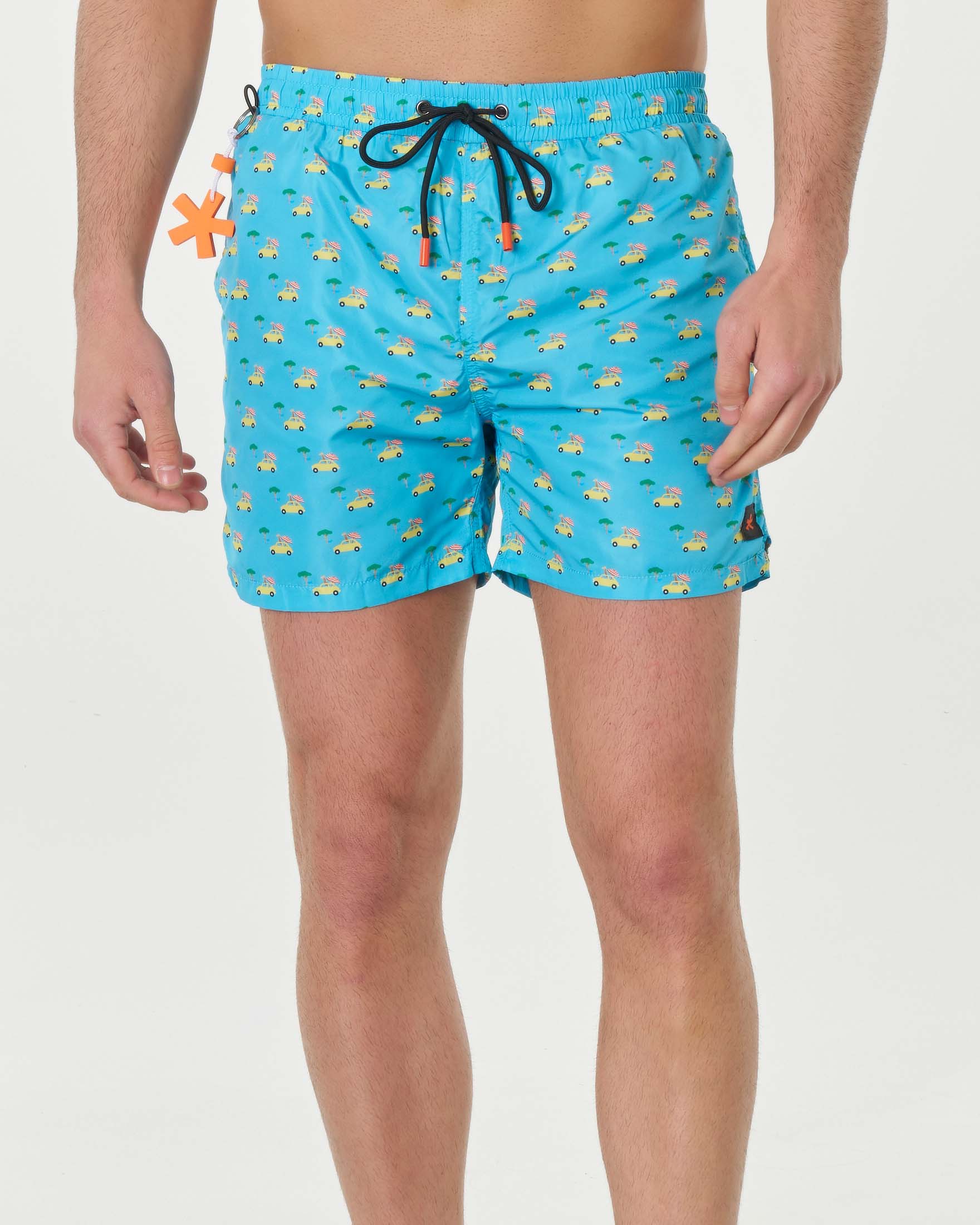 Boxer mare azzurro con stampa grafica macchinette e giraffe