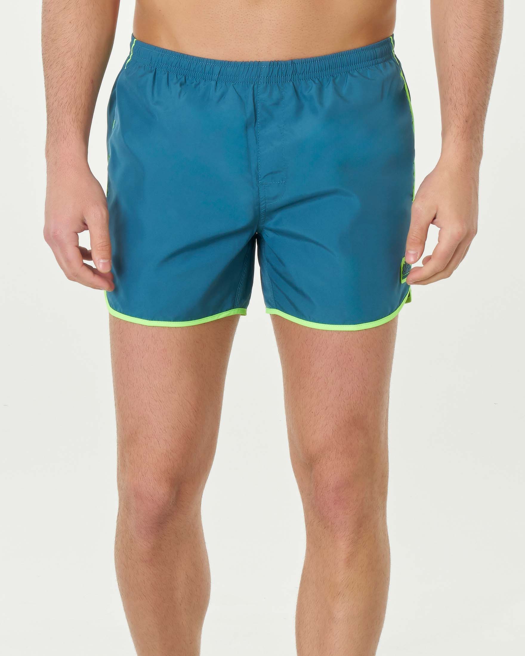 Sundek — Boxer mare running ottanio con profilo verde fluo