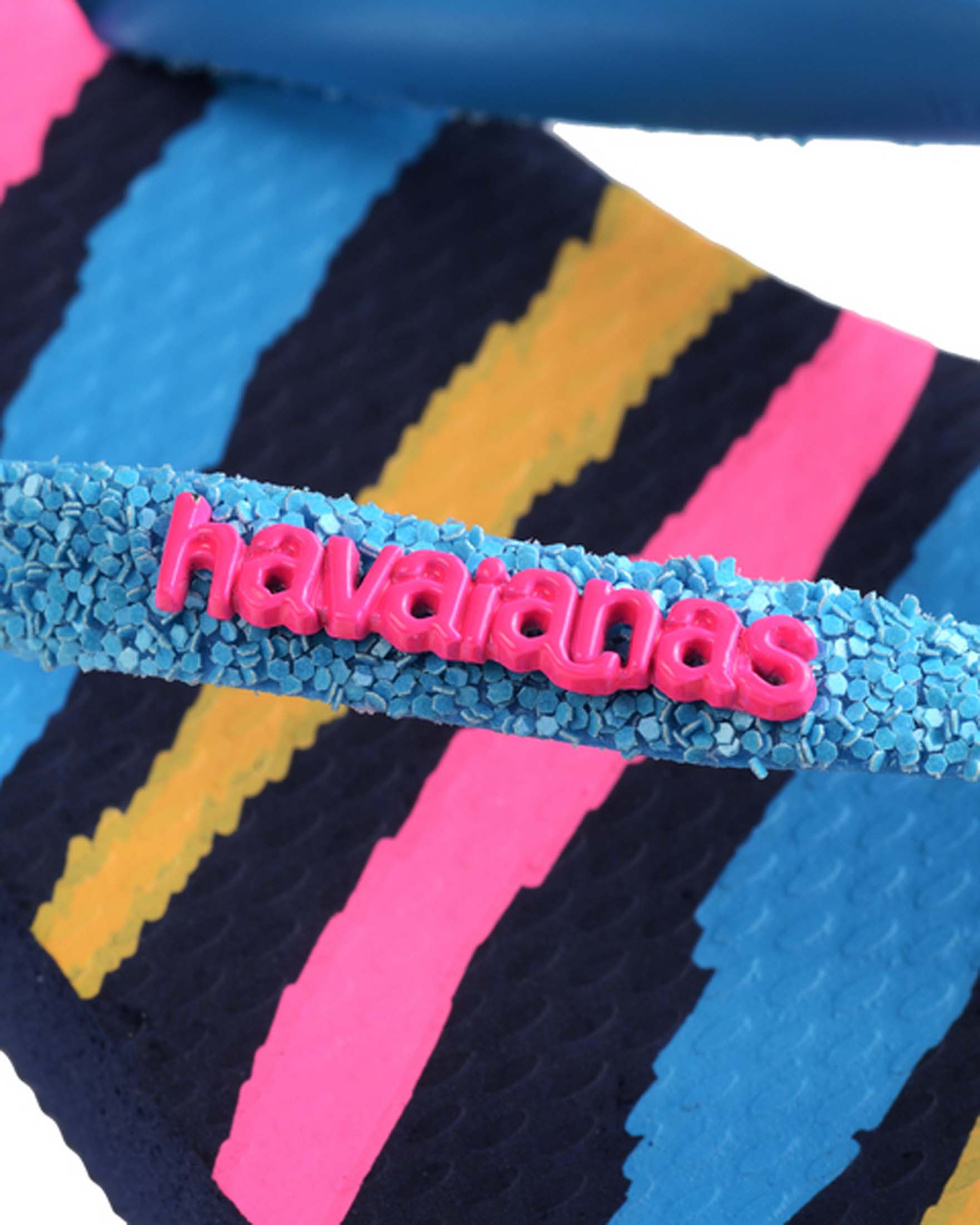 Havaianas Kids Slim Glitter con stampa zebrata multicolor e fascetta azzurra glitterata 