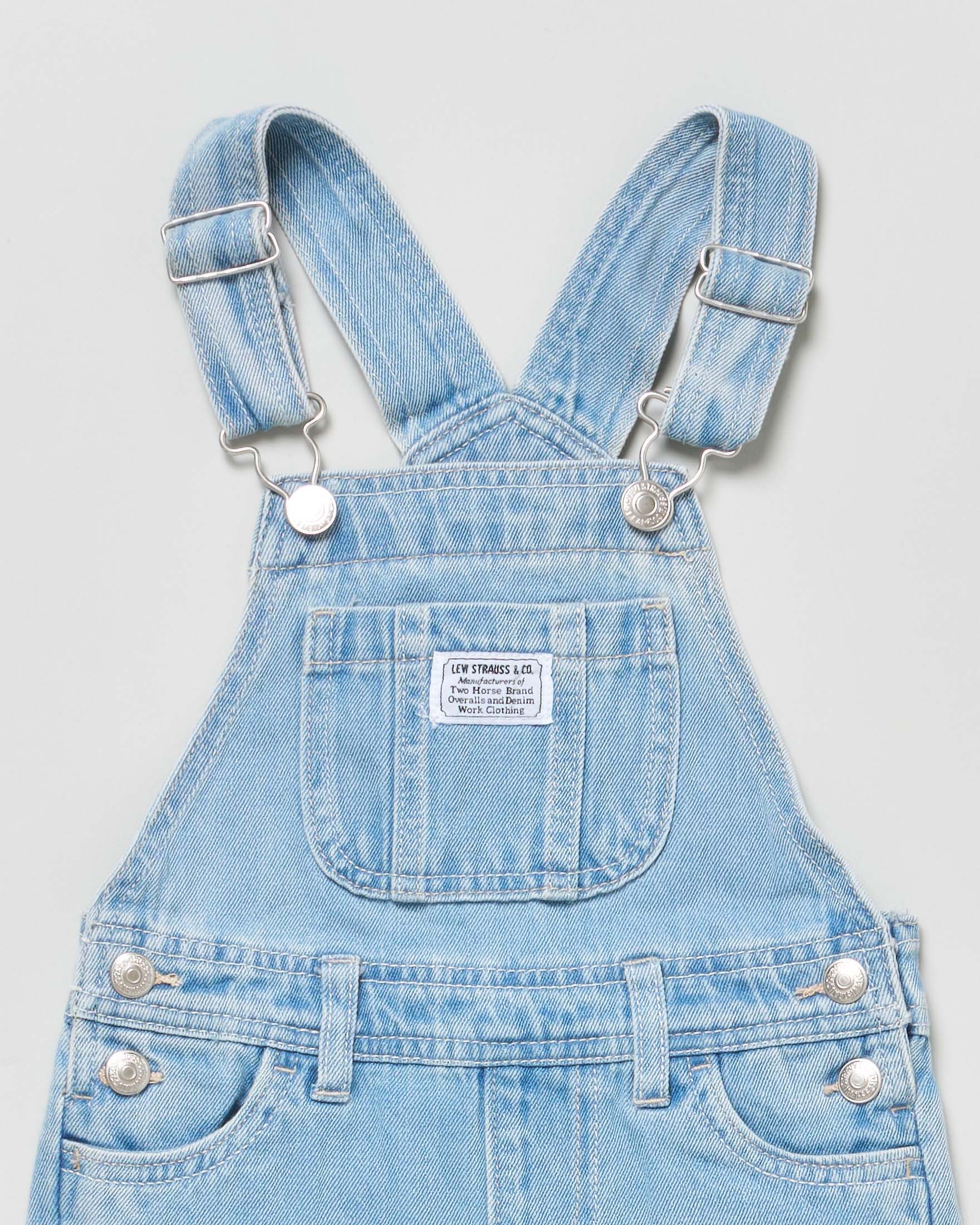 Salopette in denim di cotone a lavaggio chiaro super stone washed 