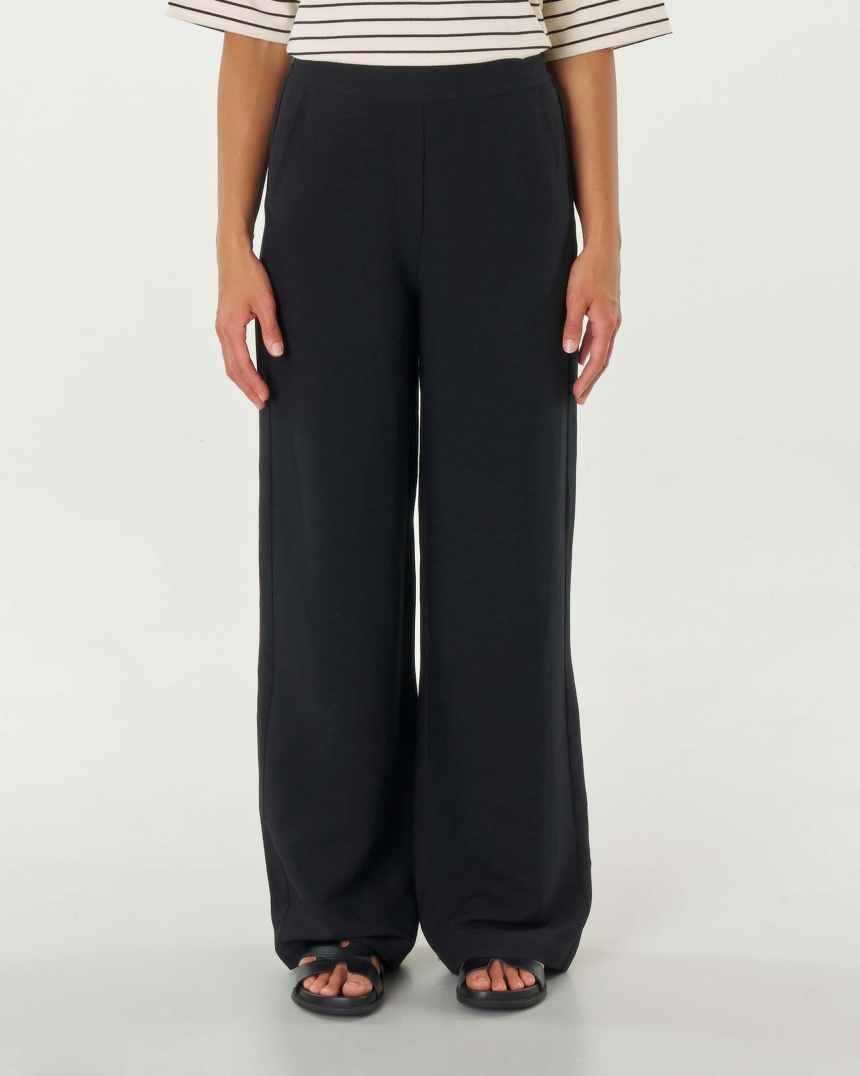 Pantaloni neri dalla linea ampia dritta a vita media in viscosa e lino con elastico in vita image