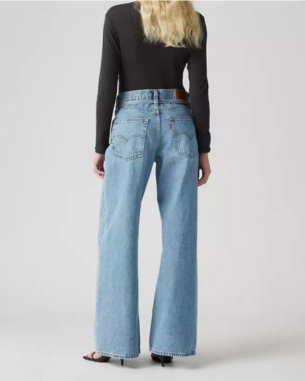 Jeans oversize wide leg a vita media lavaggio chiaro super stone washed in puro cotone con cinturina in coordinato