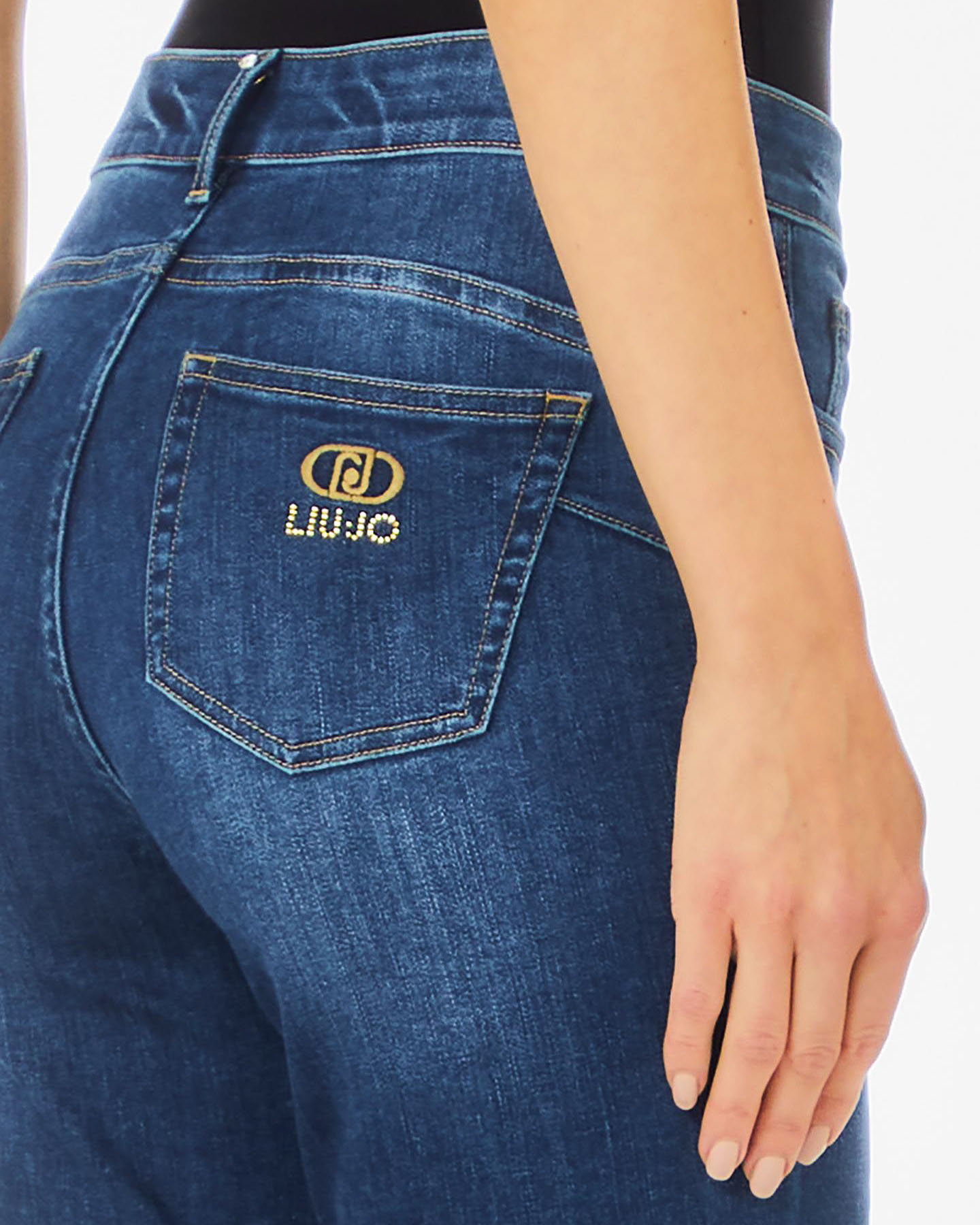Jeans skinny lavaggio medio stone washed con logo ricamato e in strass sulla tasca posteriore image