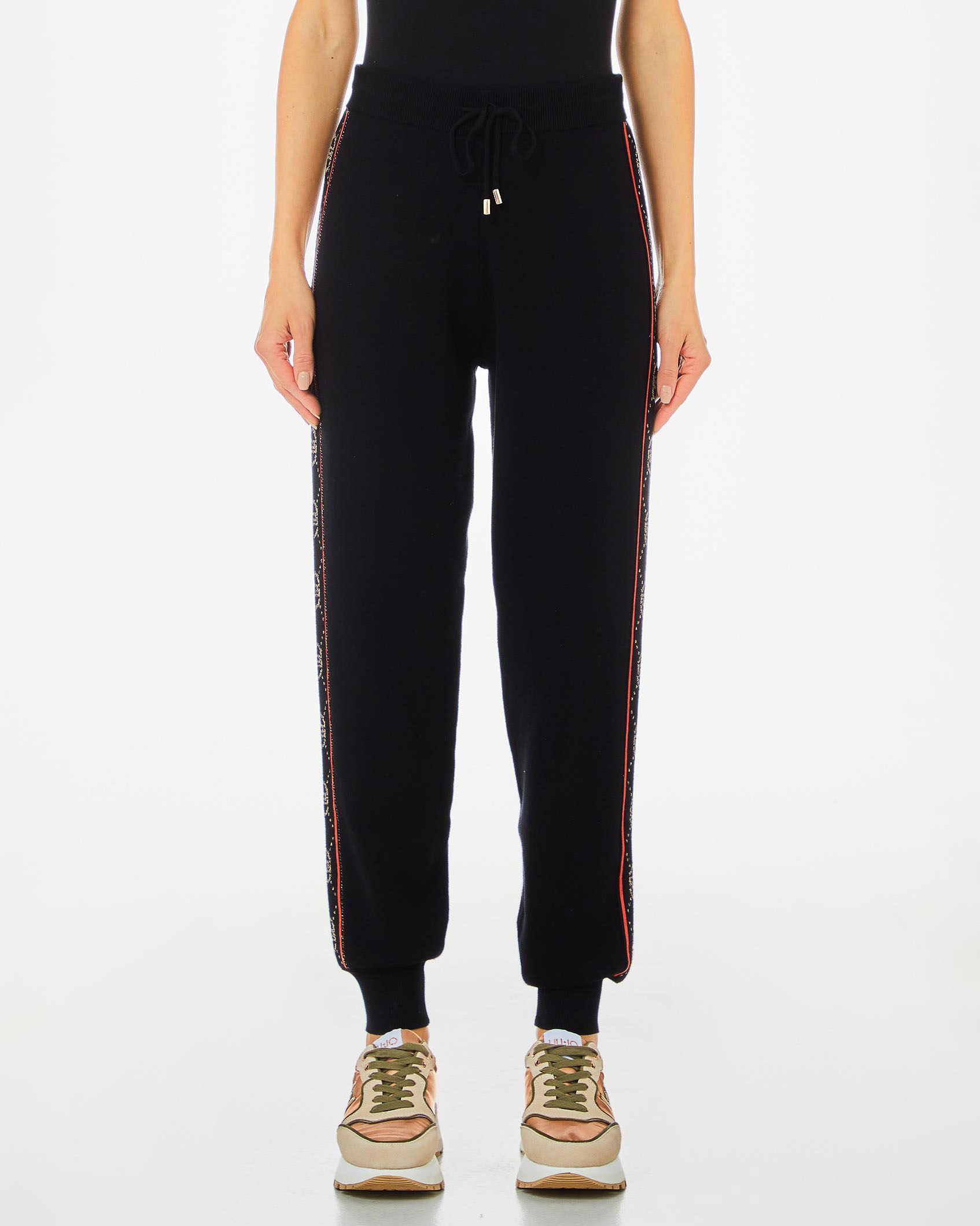 Joggers neri in maglia di viscosa con bande laterali a motivo monogram jacquard color oro in lurex