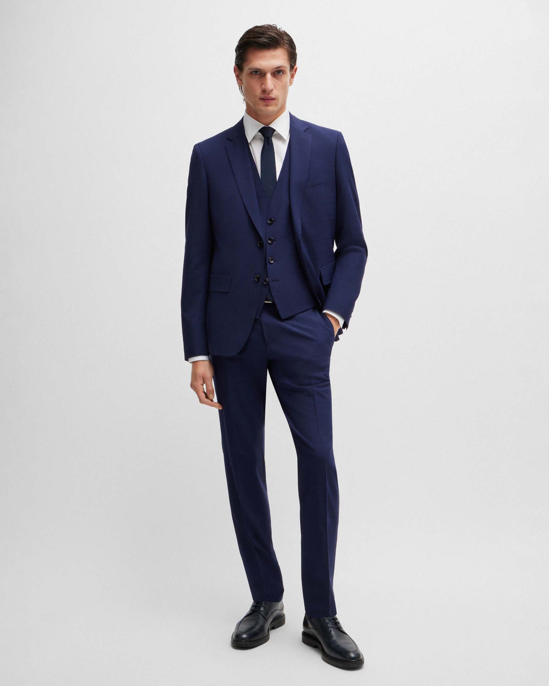 Abito Huge slim-fit blu indaco in tela di lana stretch principe di Galles con gilet