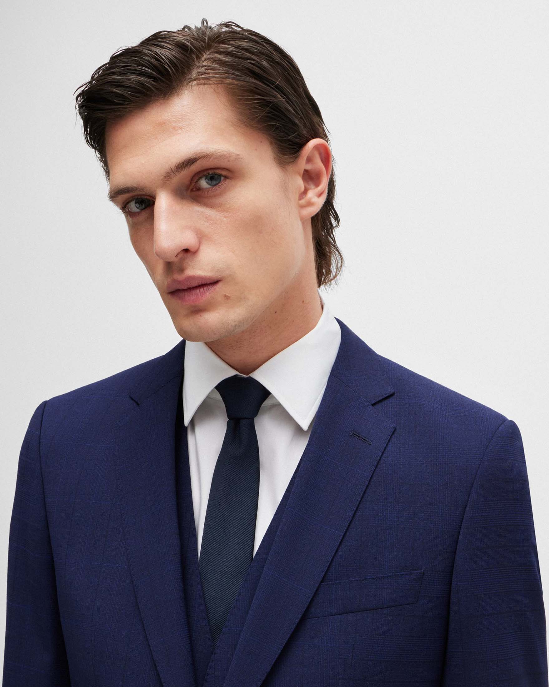 Abito Huge slim-fit blu indaco in tela di lana stretch principe di Galles con gilet