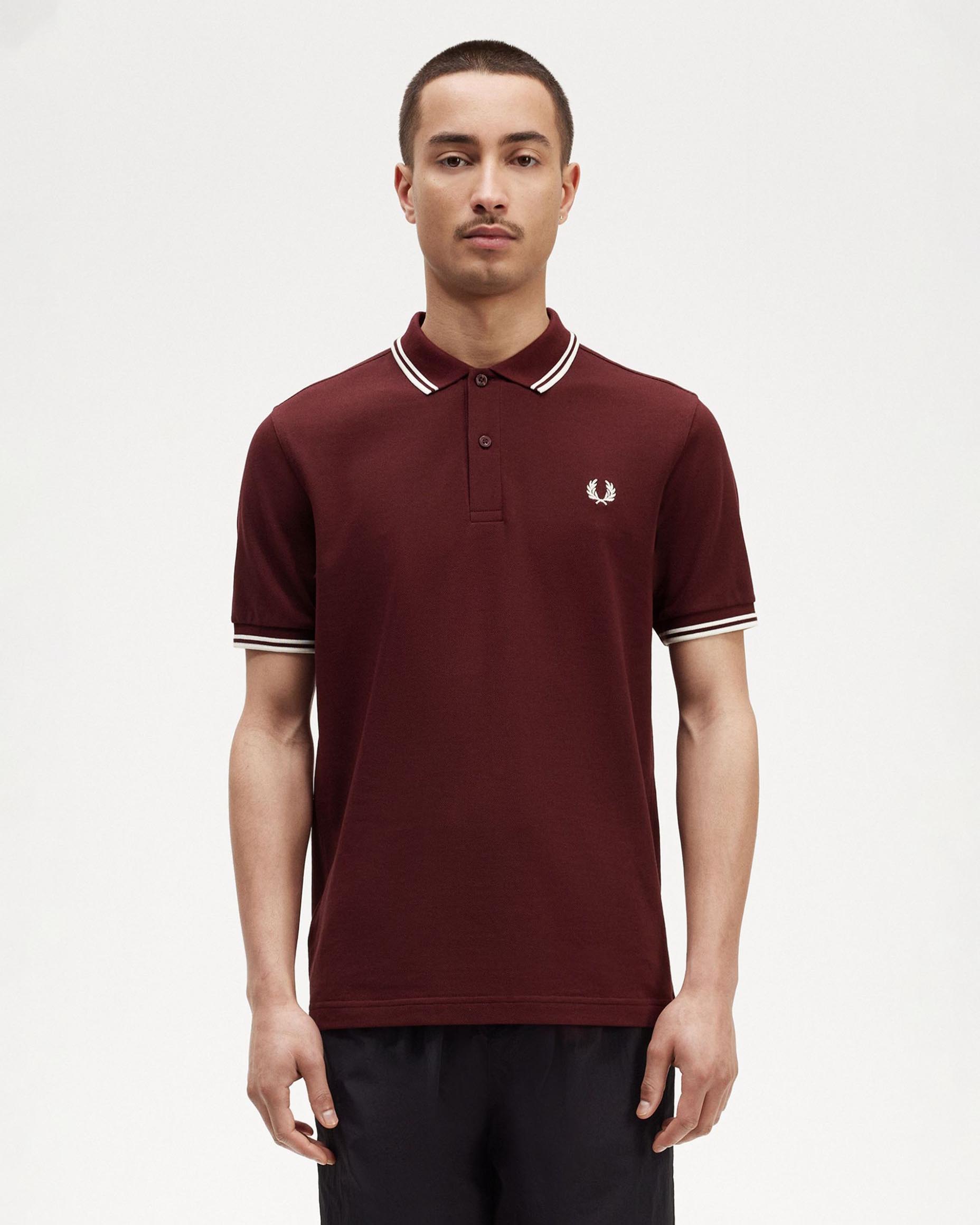 Polo bordeaux mezza manica con bordino bianco