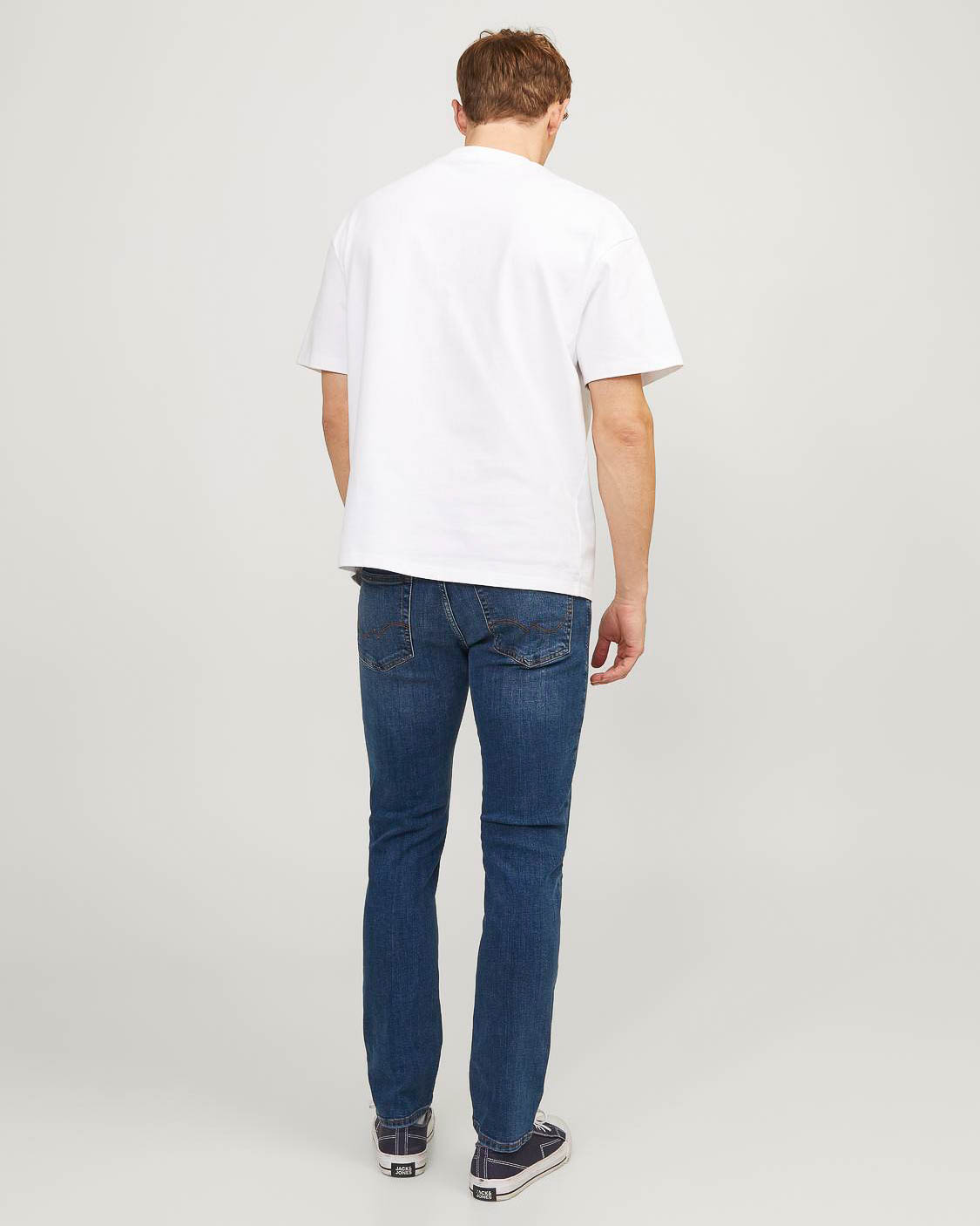 Jeans Tim slim-fit a gamba dritta in cotone stretch lavaggio medio con baffature image