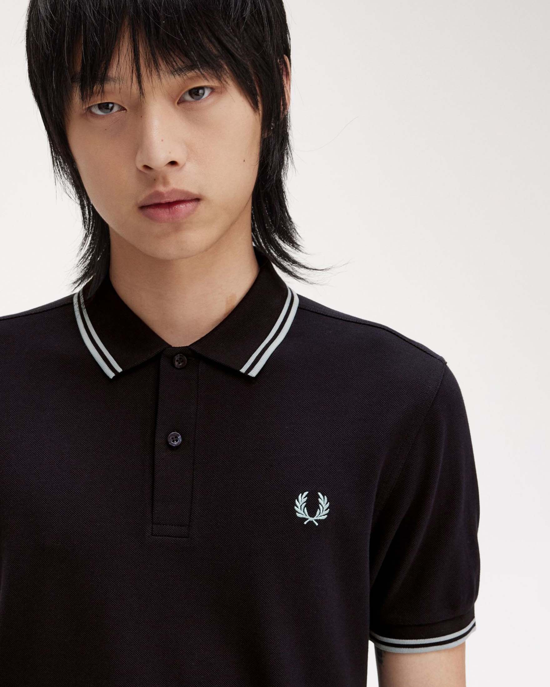 Polo blu mezza manica con bordino azzurro image