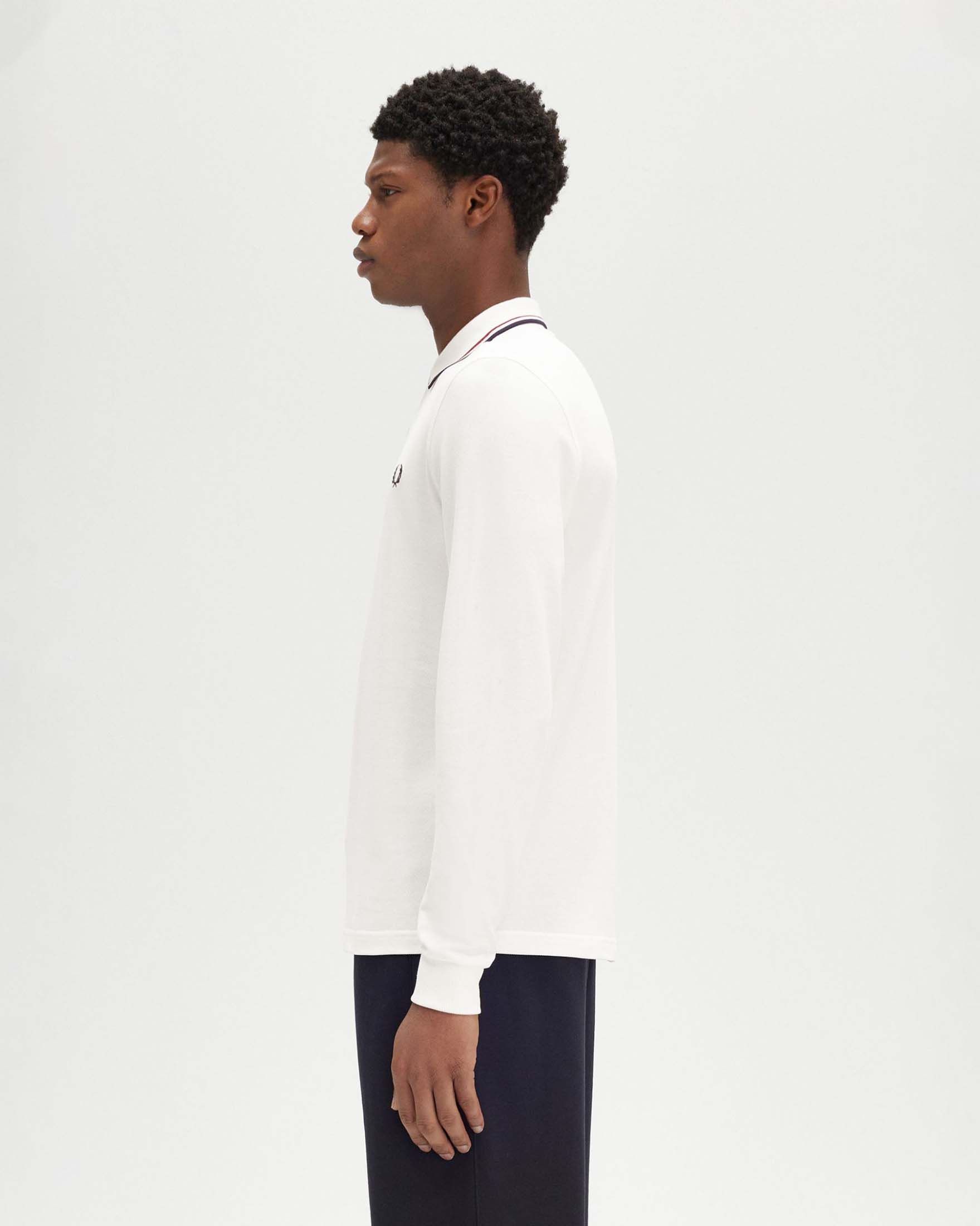 Polo manica lunga Fred Perry bianca con bordino blu e rosso
