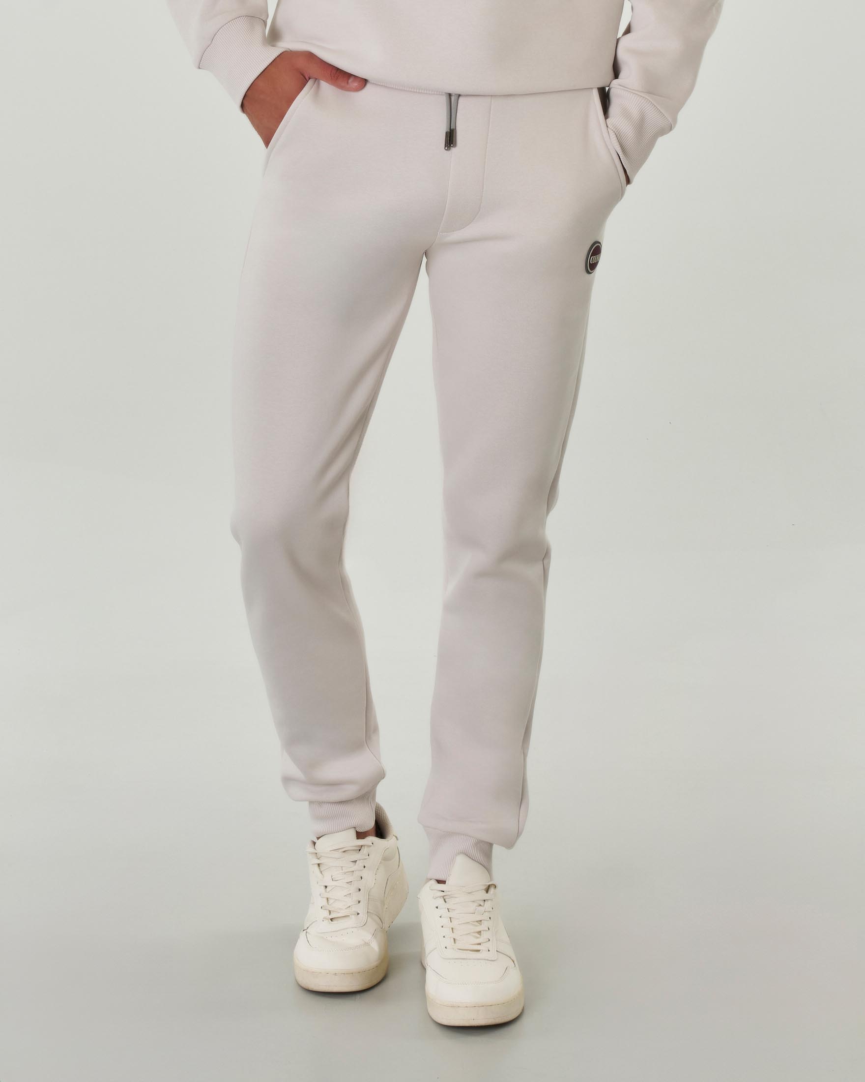 Pantalone avorio in felpa di cotone con logo bollo applicato