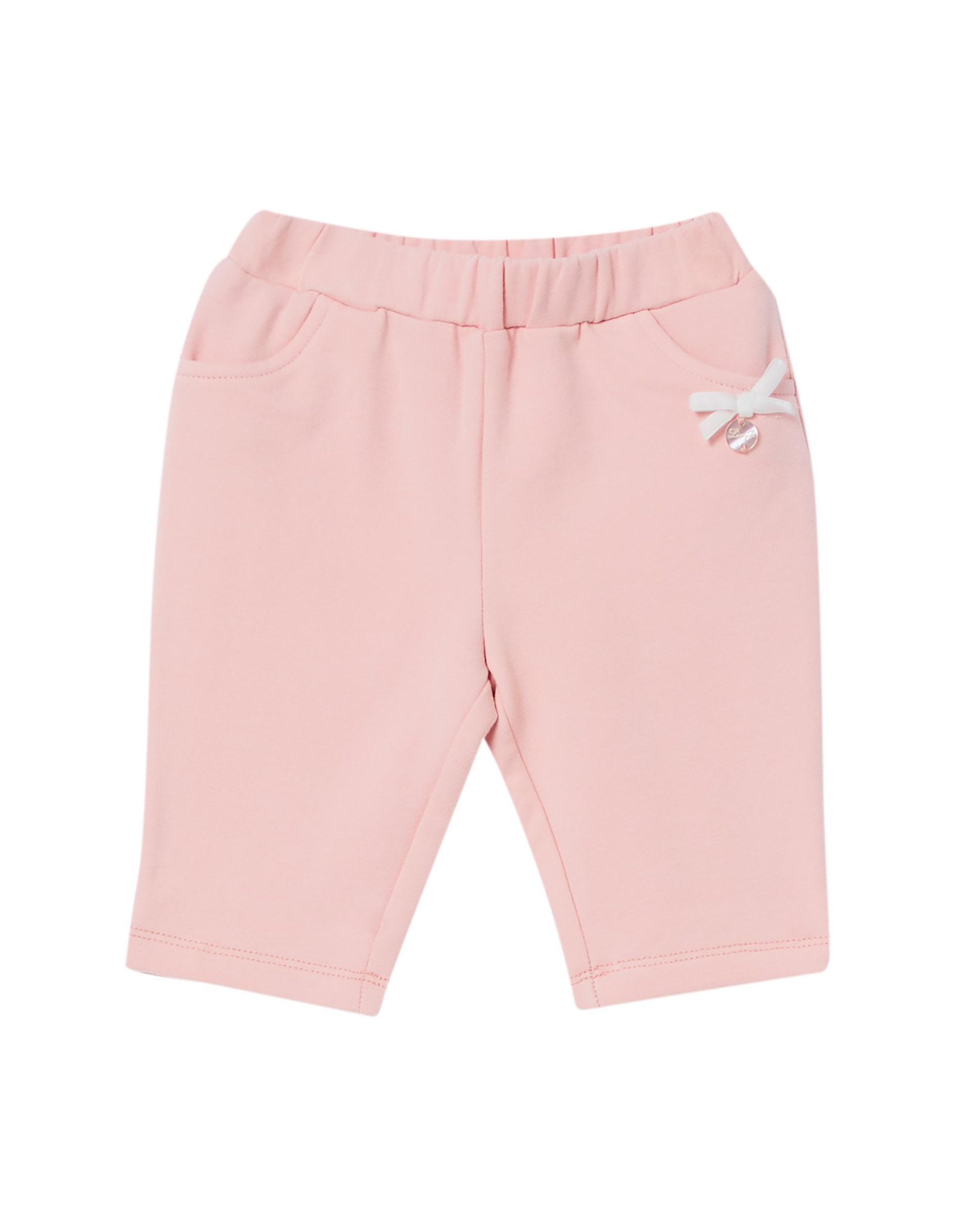 Pantaloni Liu Jo cipria in felpa di cotone stretch con fiocchetto bianco