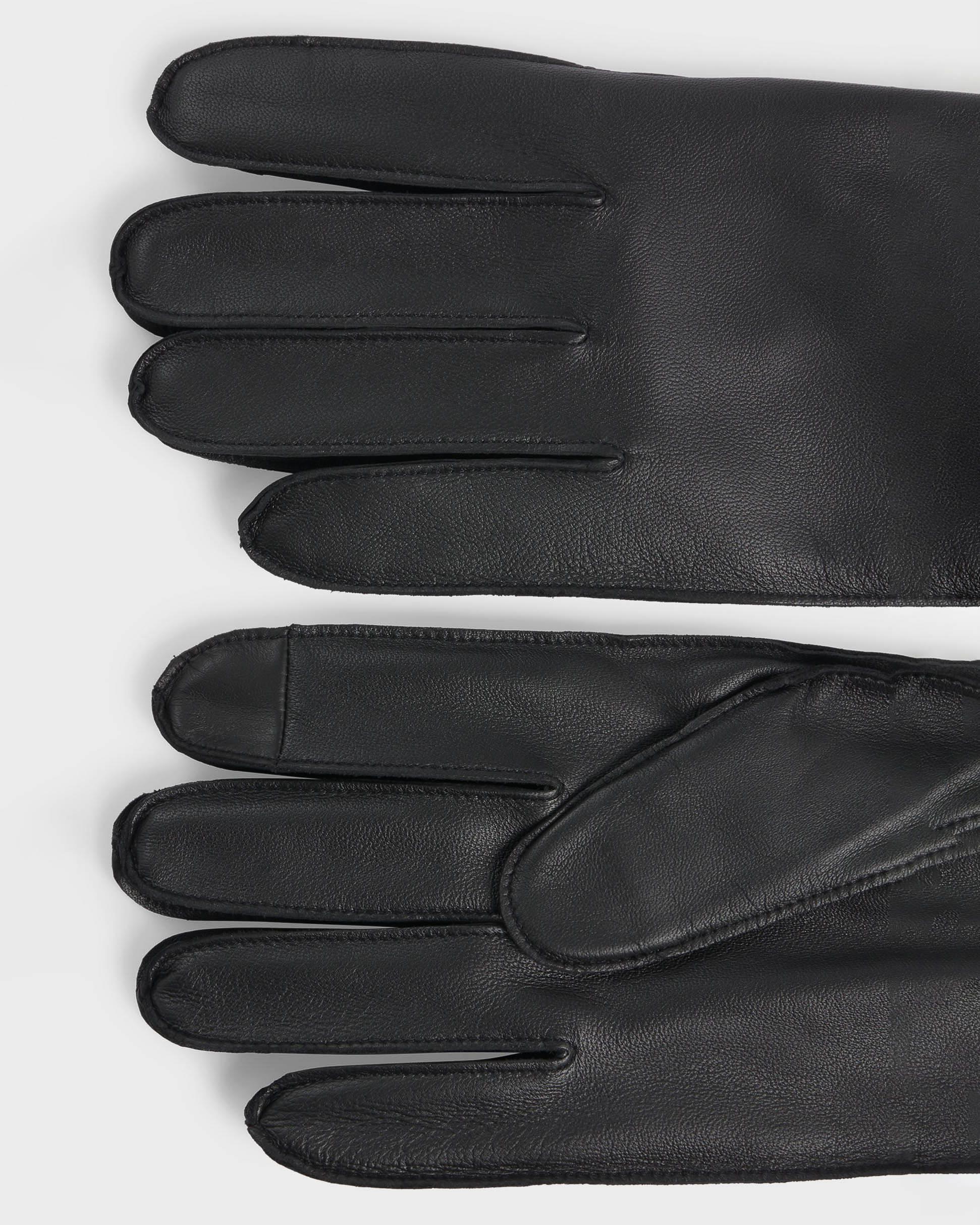 Guanti neri in pelle martellata con fodera in lana image