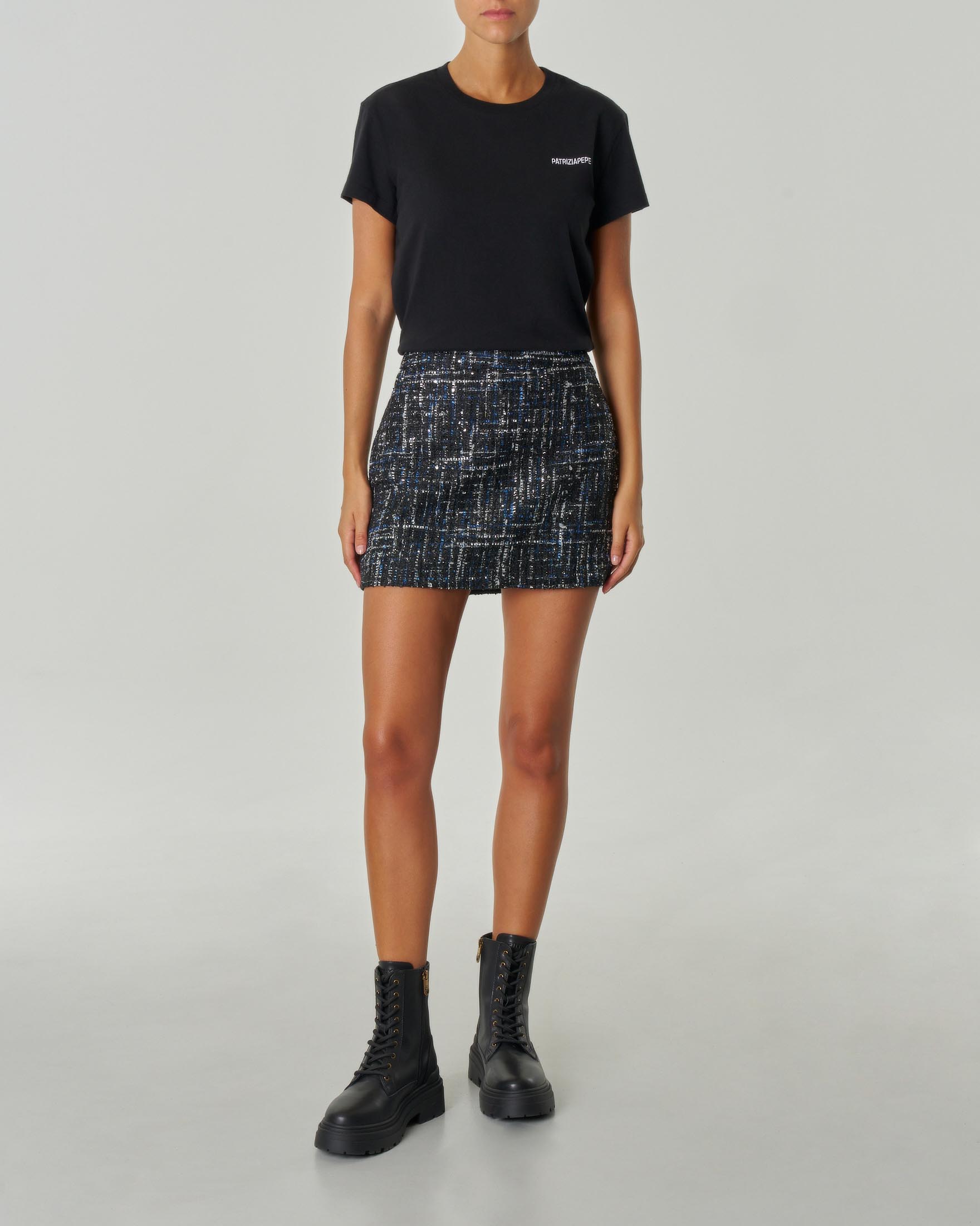 Minigonna nera in bouclè con inserti color avio e bianco