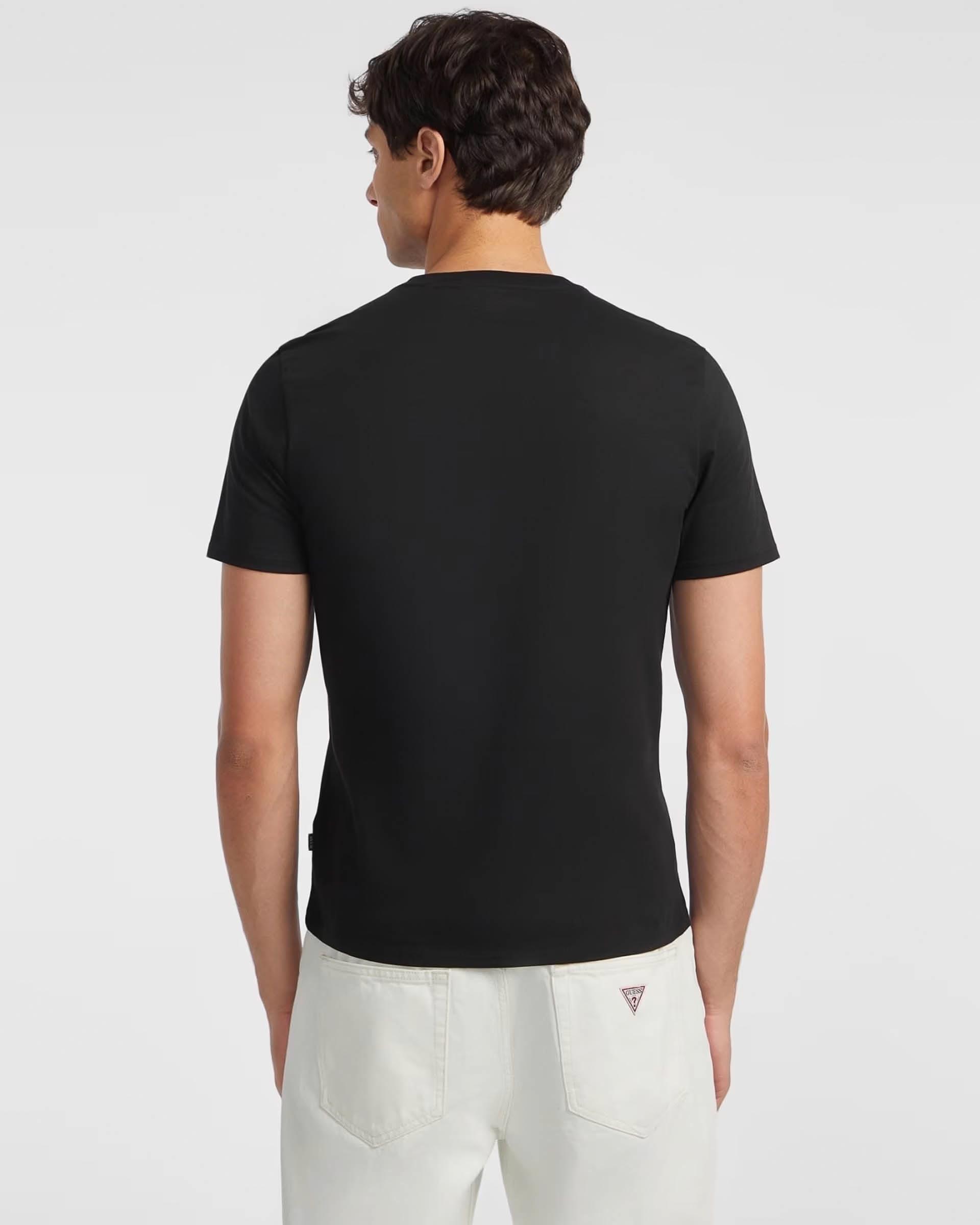 T-shirt slim mezza manica Guess Jeans nera in puro cotone con logo scritta image