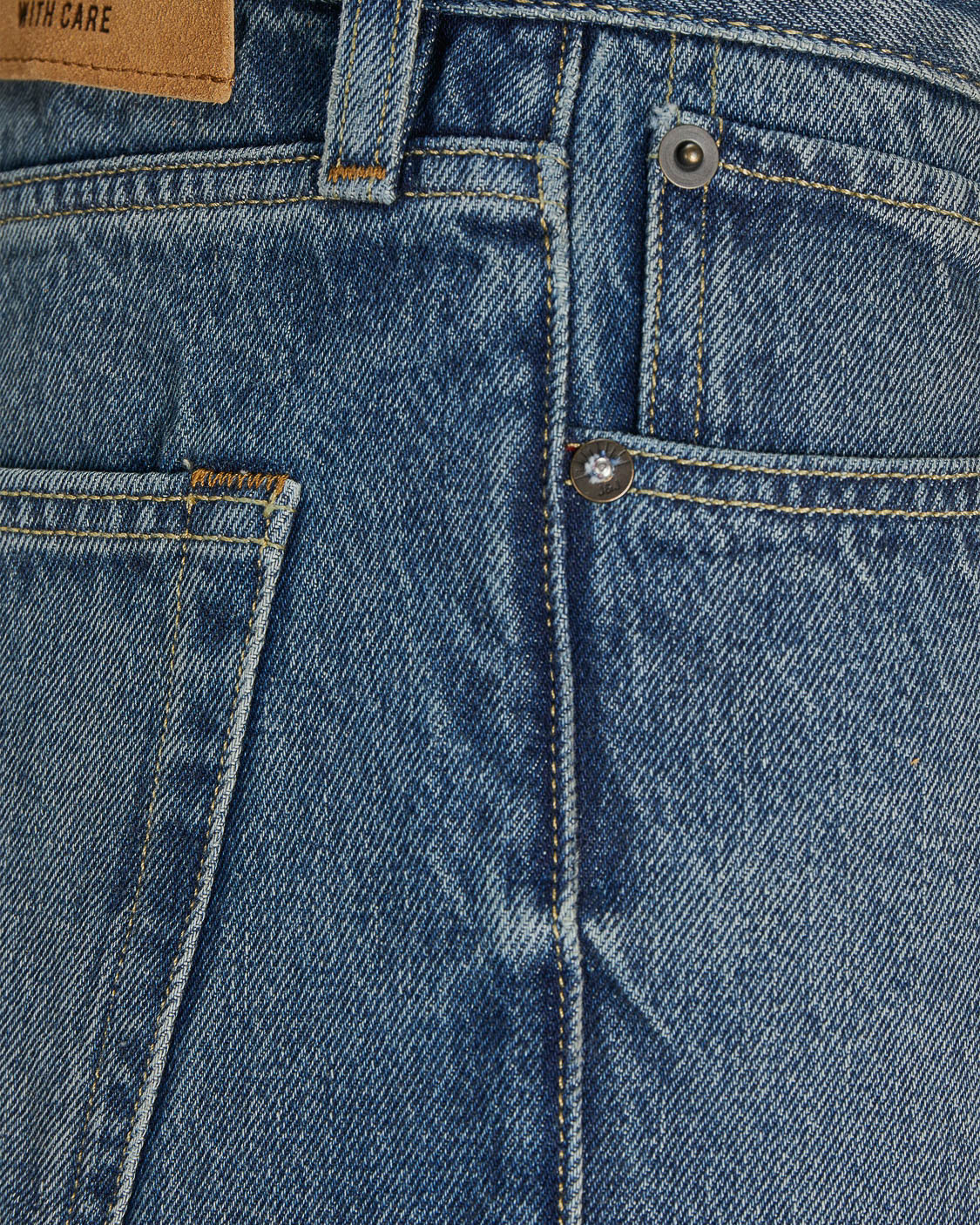 Jeans Chris relaxed-fit a gamba dritta in puro cotone lavaggio medio con sabbiature