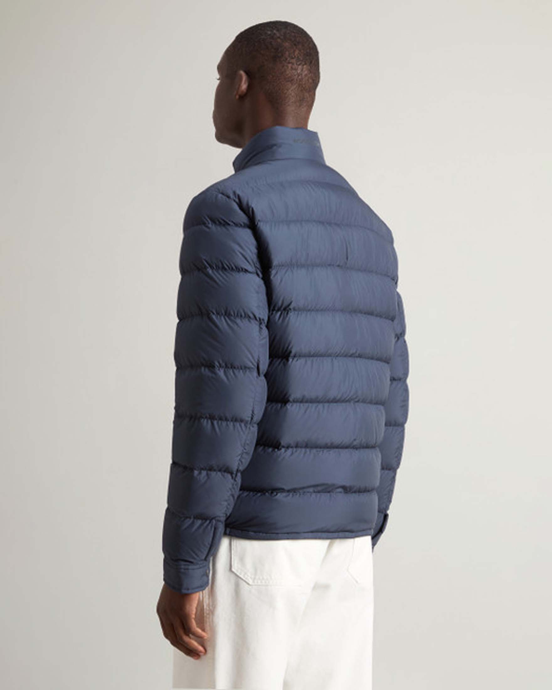 Piumino blu in microfibra senza cappuccio image