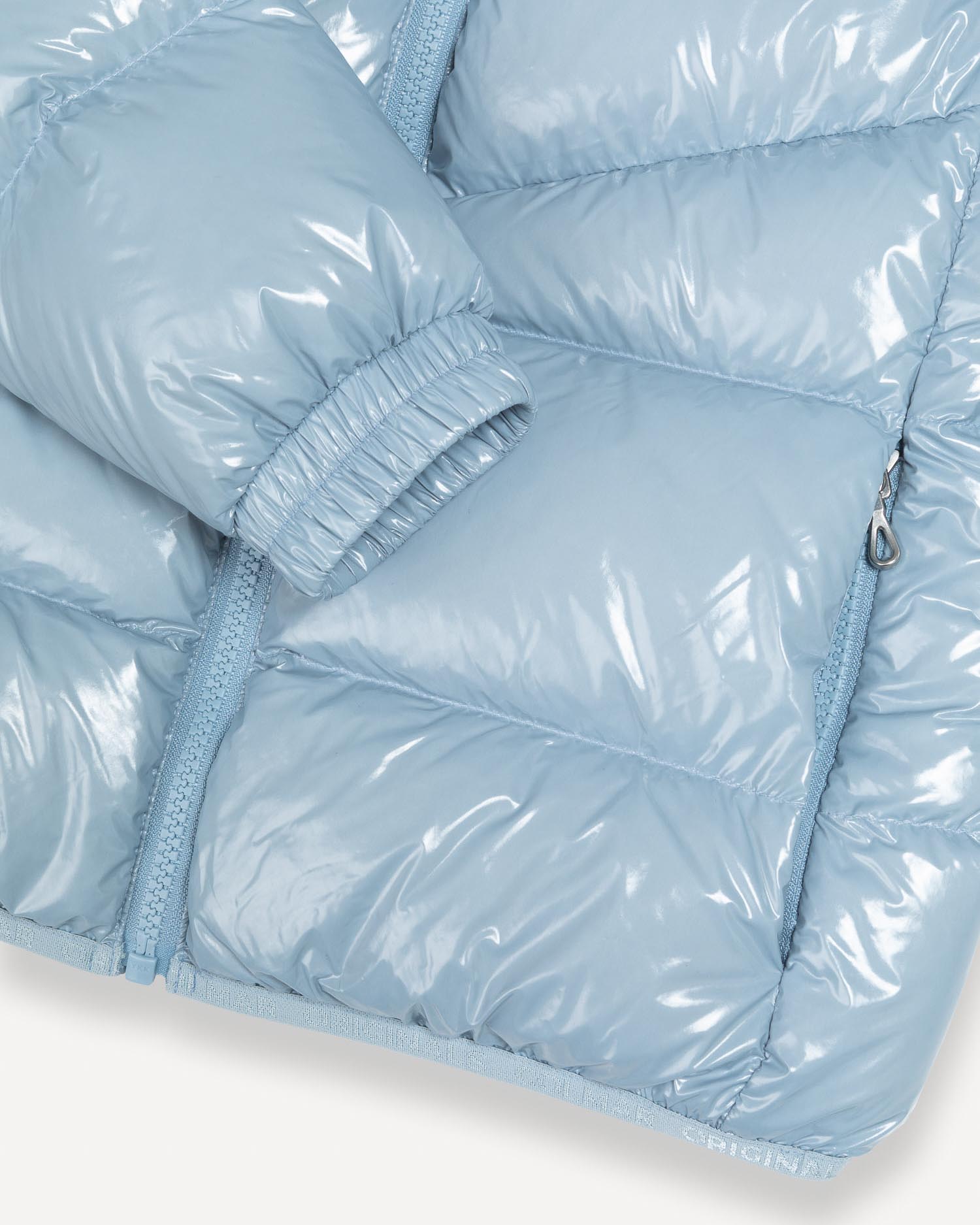 Piumino Colmar azzurro in nylon lucido imbottito con cappuccio image