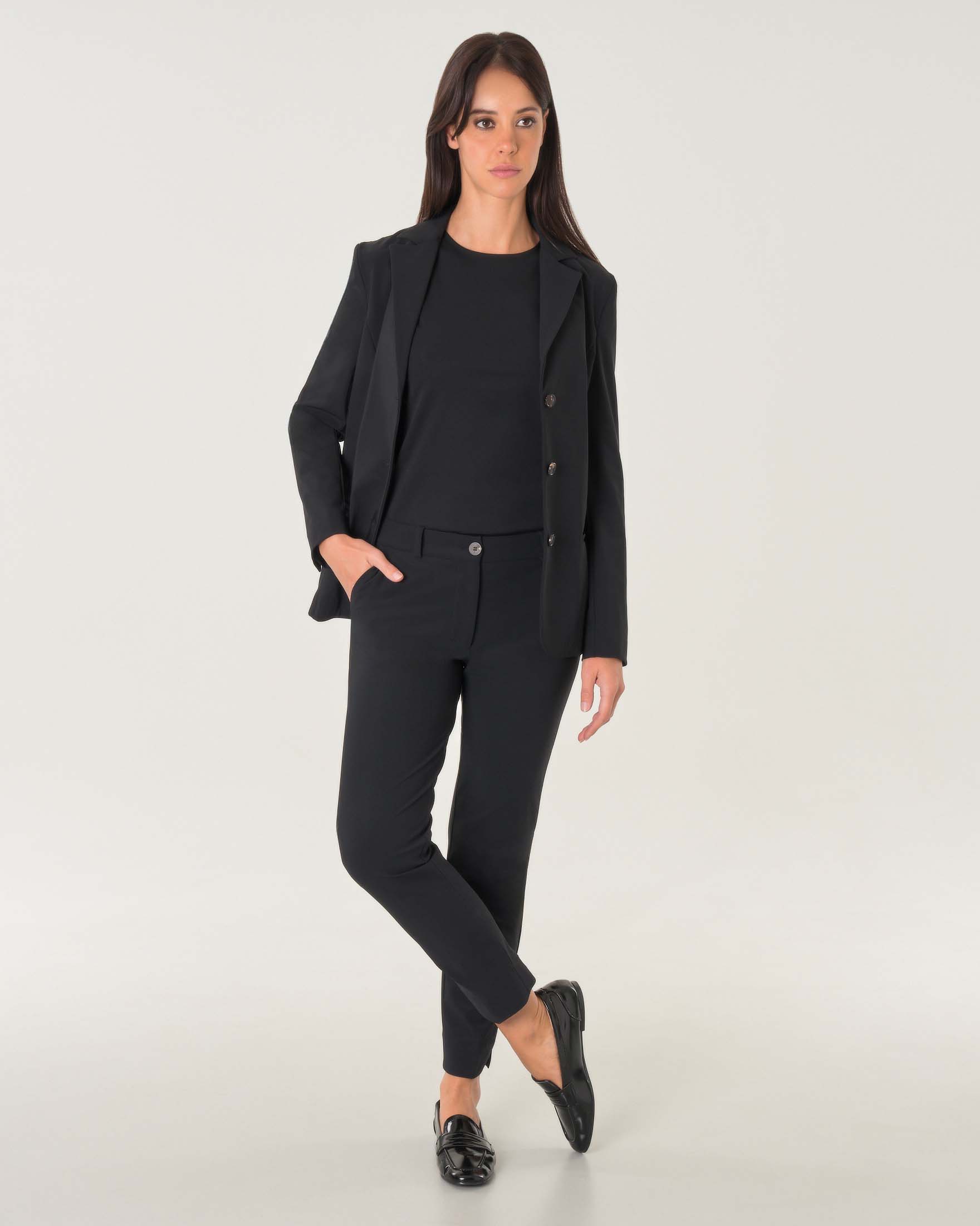 Pantaloni slim neri in tessuto tecnico lunghezza alla caviglia con spacchetti laterali