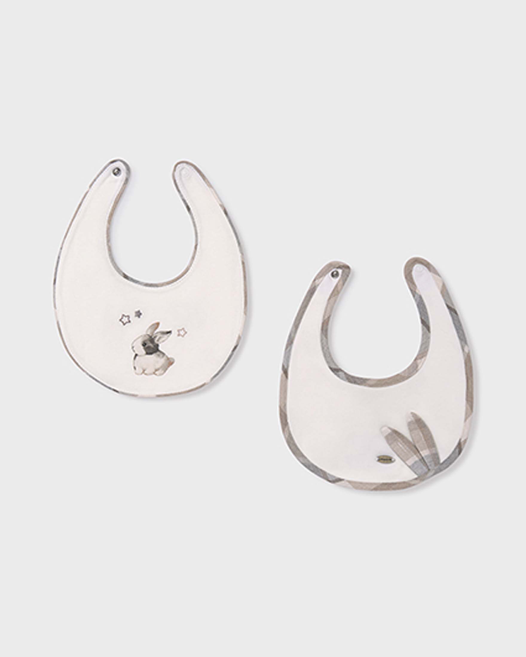 Bavaglini beige e bianchi con coniglietto o con profili tartan con coniglietto