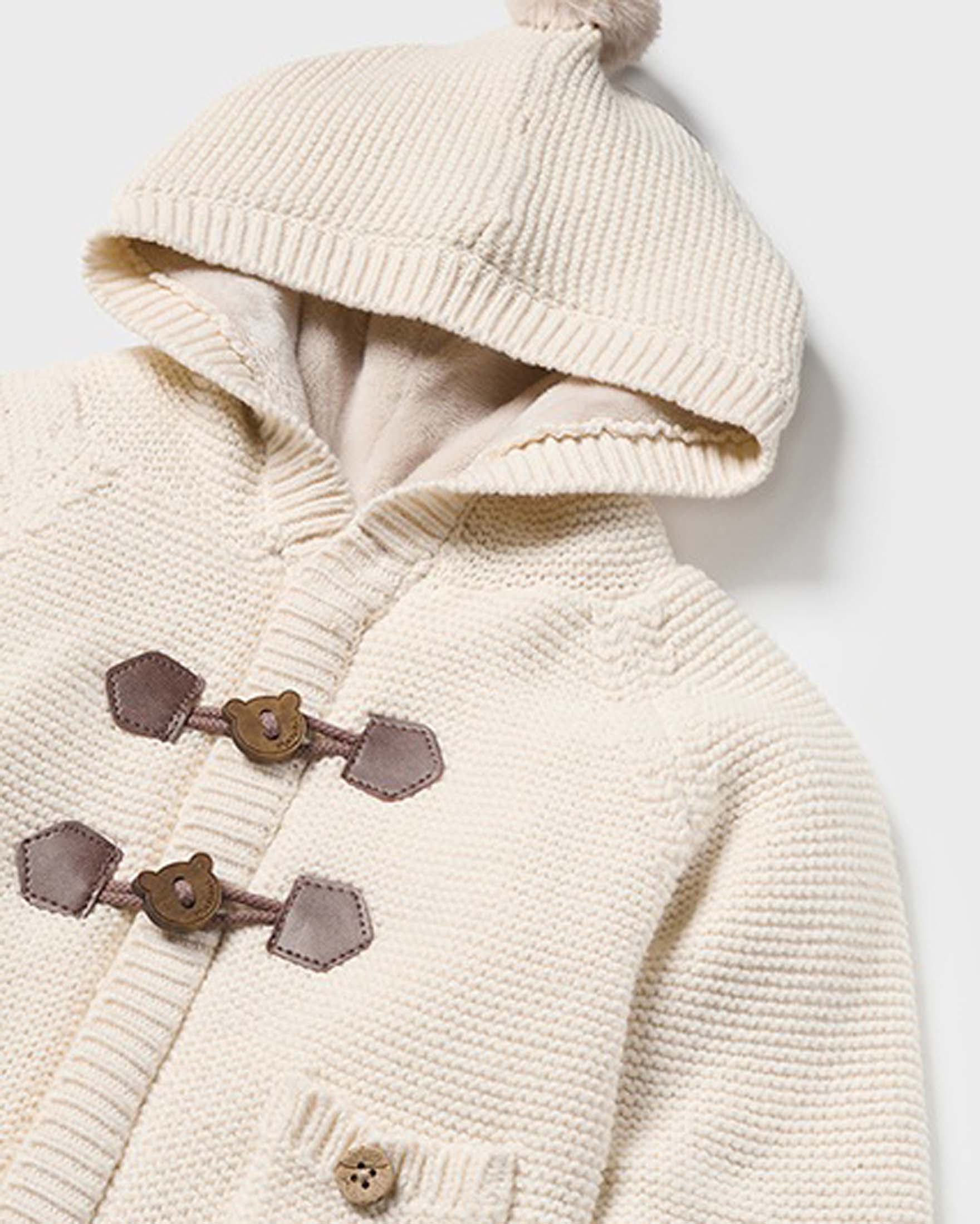 Giacca panna in cotone tricot con cappuccio ed alamari image