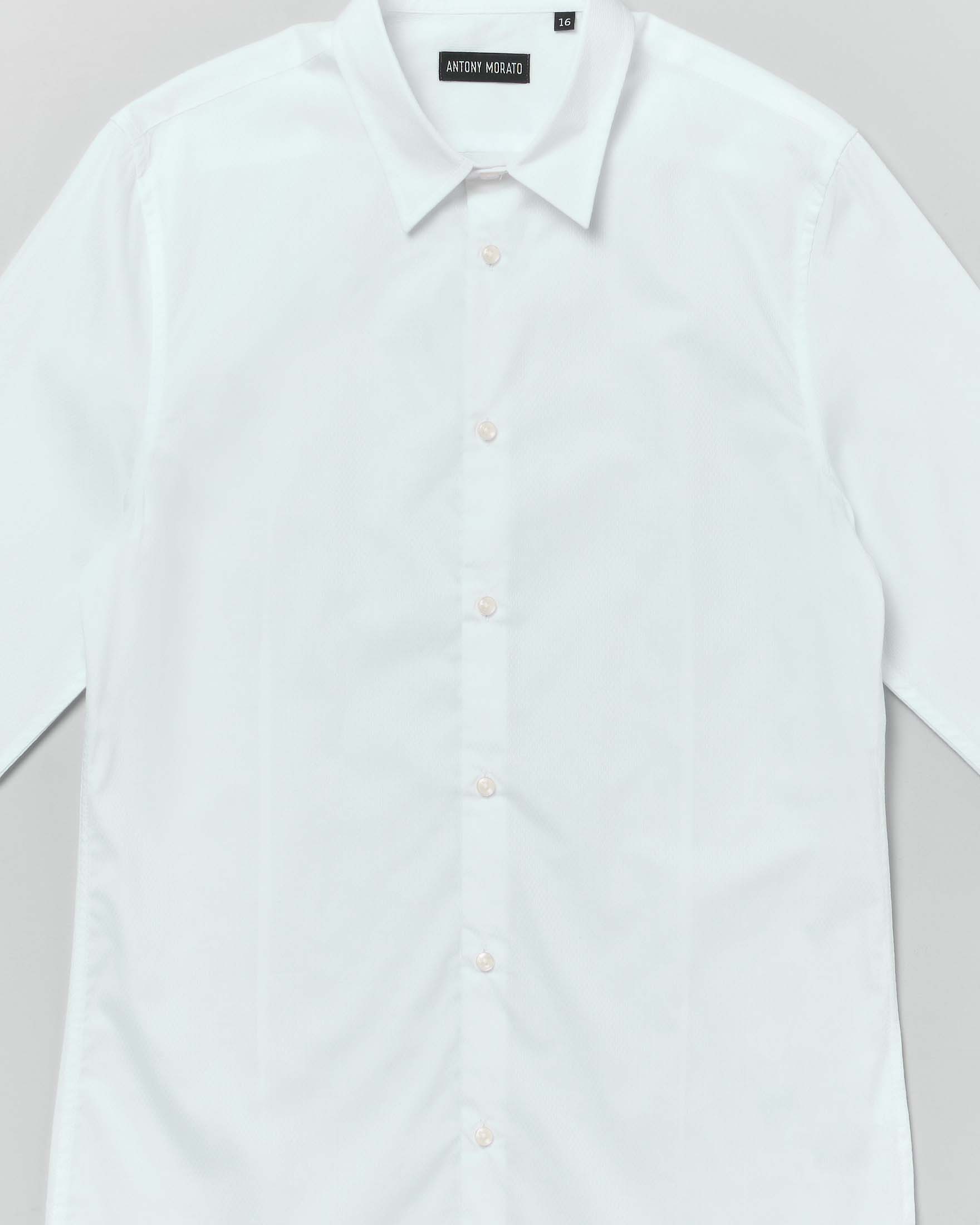 Camicia bianca in cotone operato a maniche lunghe image