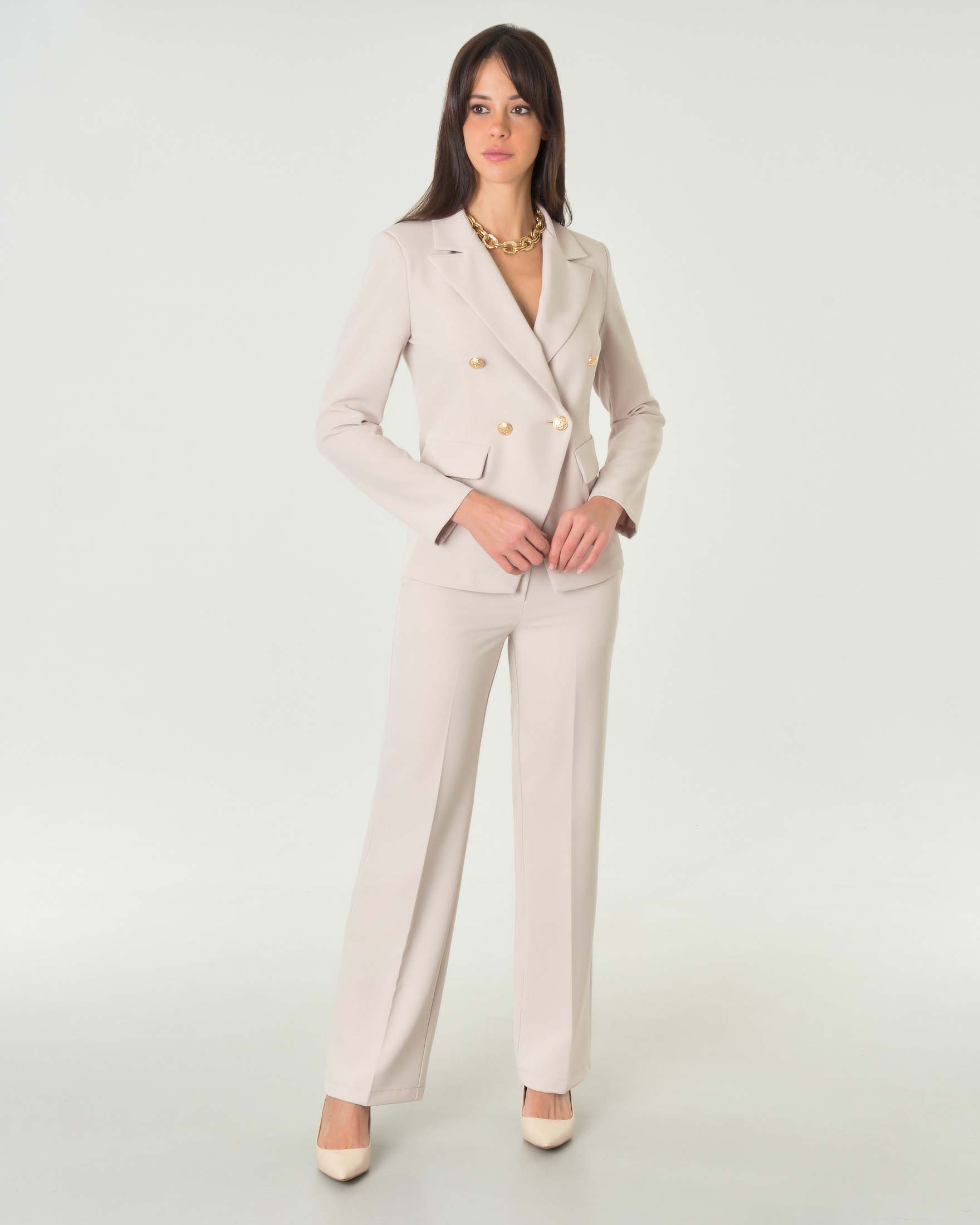 Pantaloni staight color burro in tessuto tecnico stretch