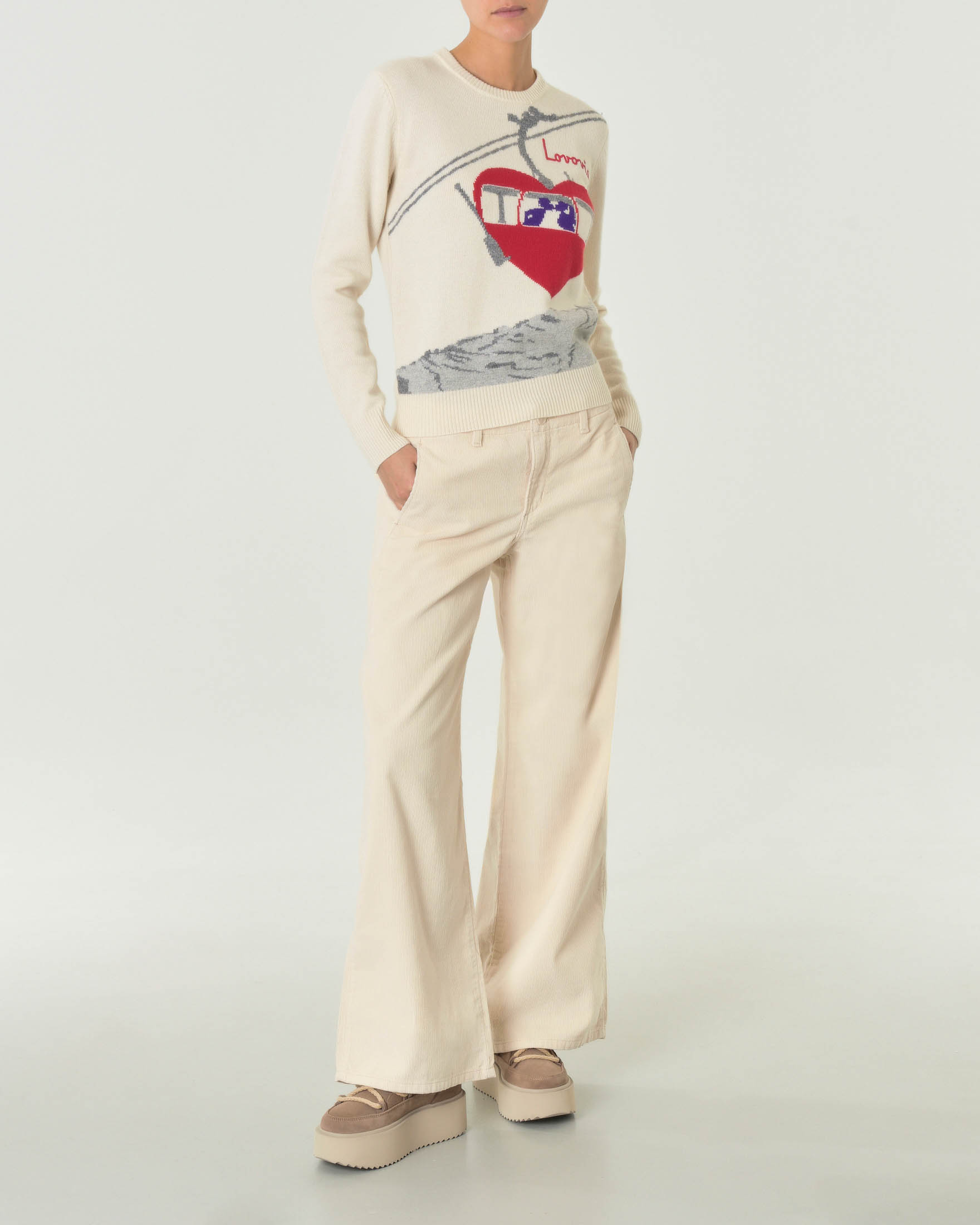 Pantaloni color panna in cotone dalla linea wide in velluto a righe