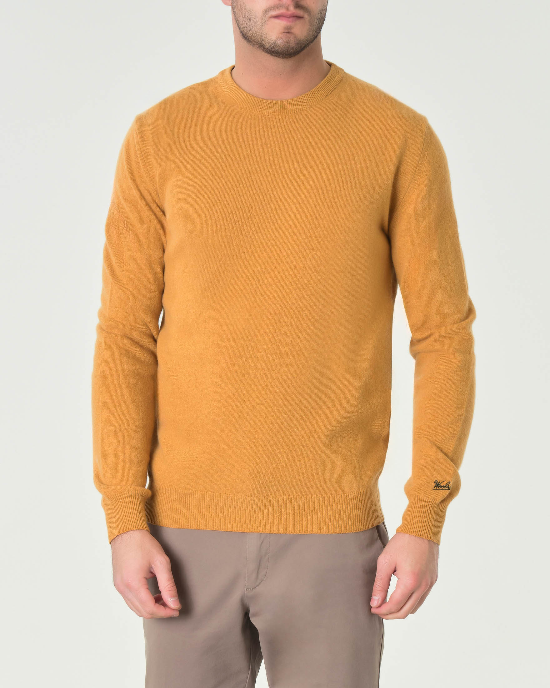 Maglia girocollo arancione in lambswool di pura lana con logo ricamato sul polso