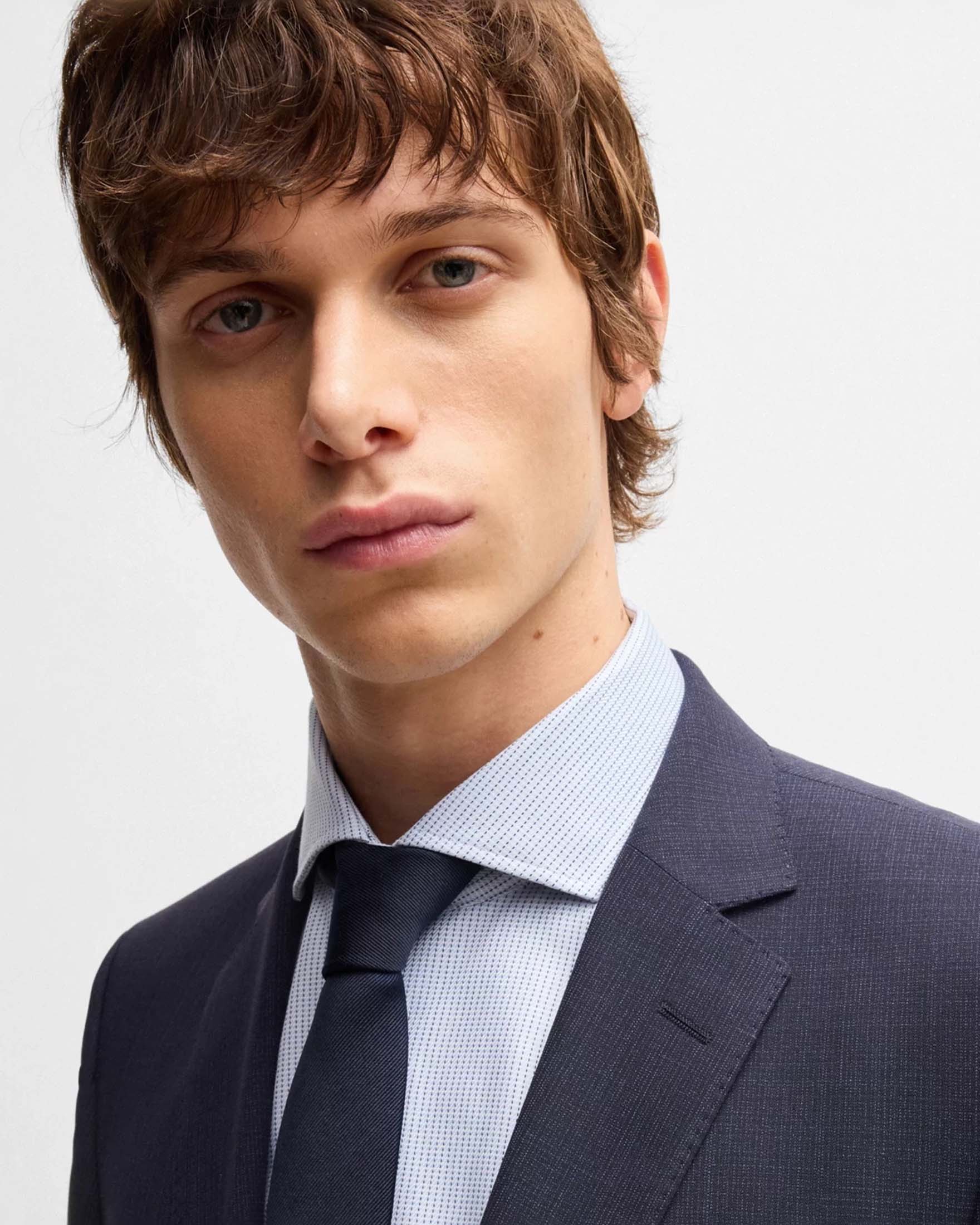 Abito Huge blu slim-fit in tessuto elasticizzato di misto lana a micro motivo image