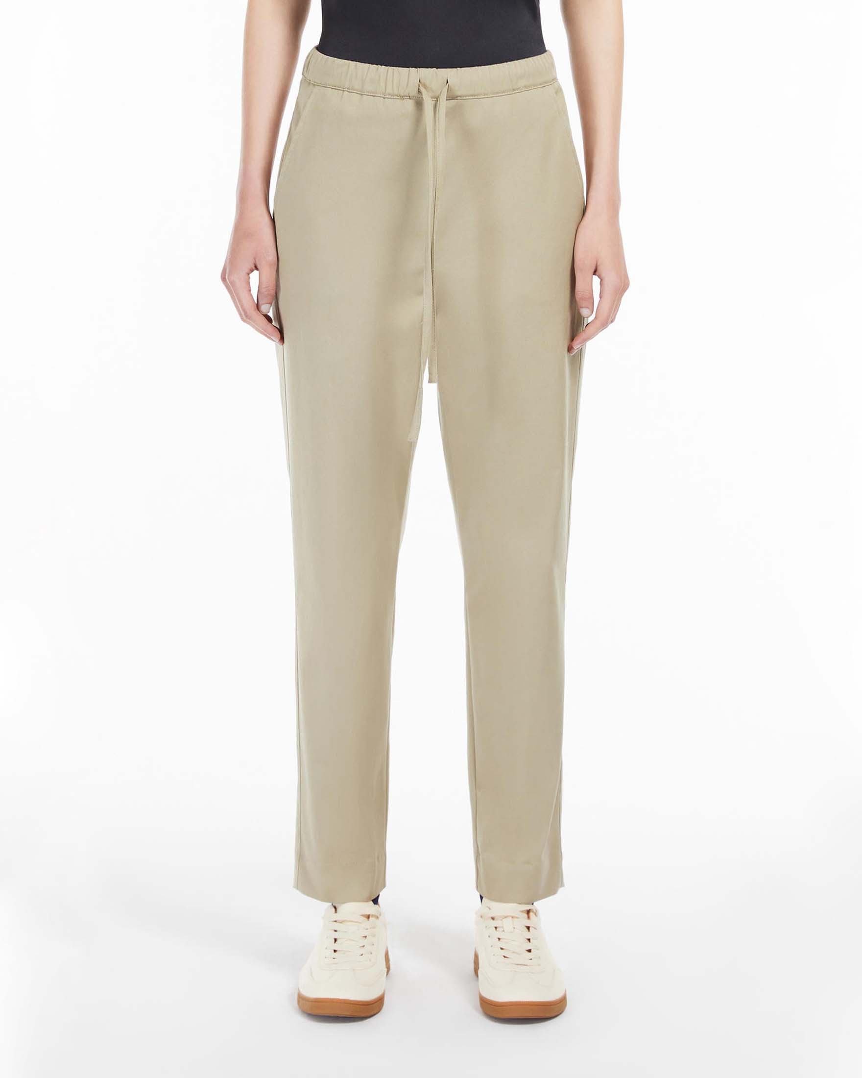 Joggers beige in cotone stretch con coulisse inserita in vita