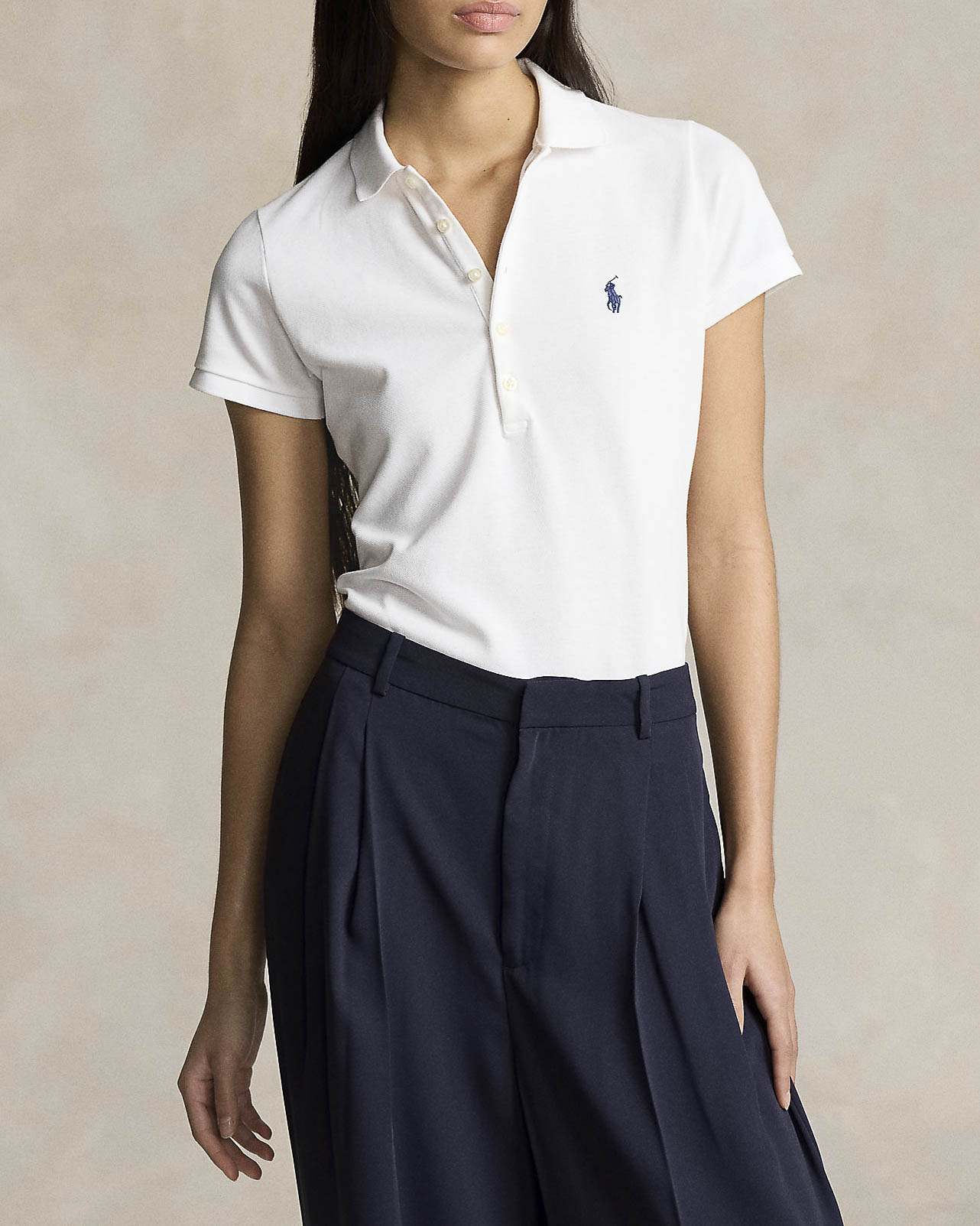 Polo Ralph Lauren — Polo bianca Polo Ralph Lauren in piquè di misto cotone con chiusura a 5 bottoni e logo blu ricamato