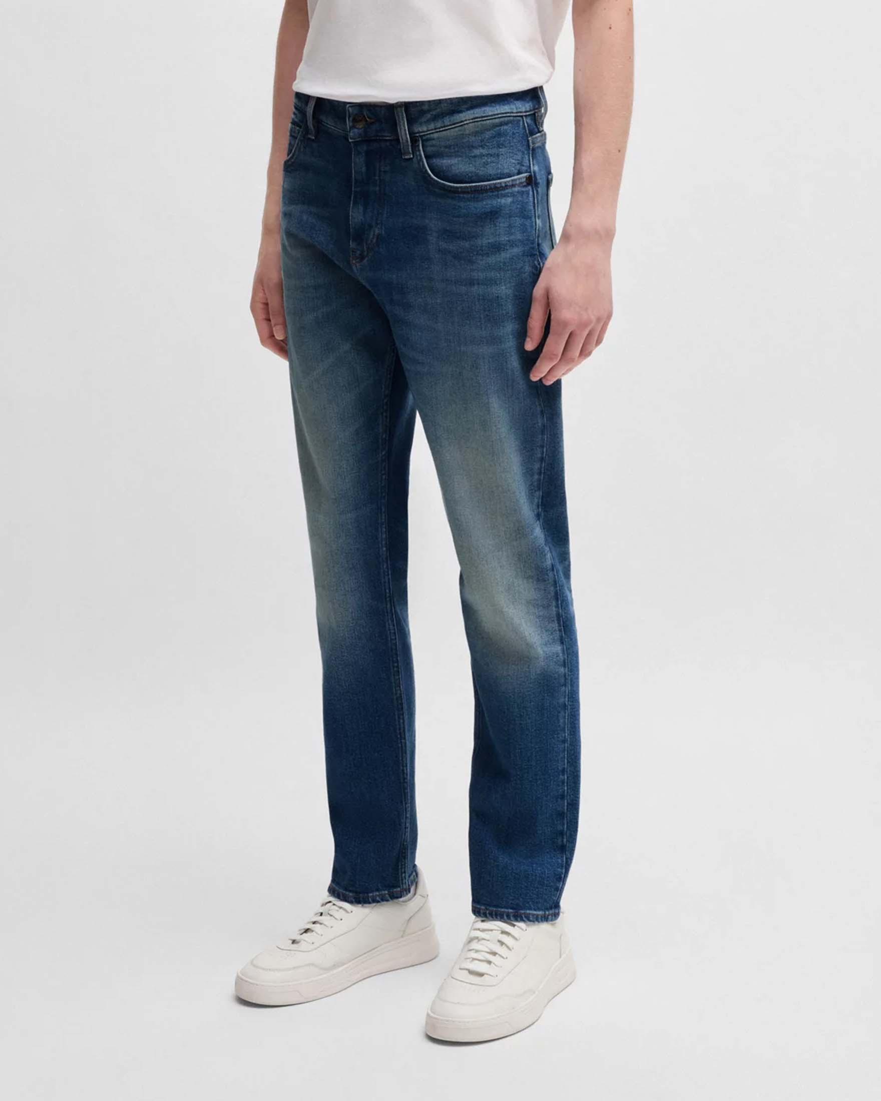 Jeans Delaware slim fit in cotone stretch lavaggio medio stone washed con baffature