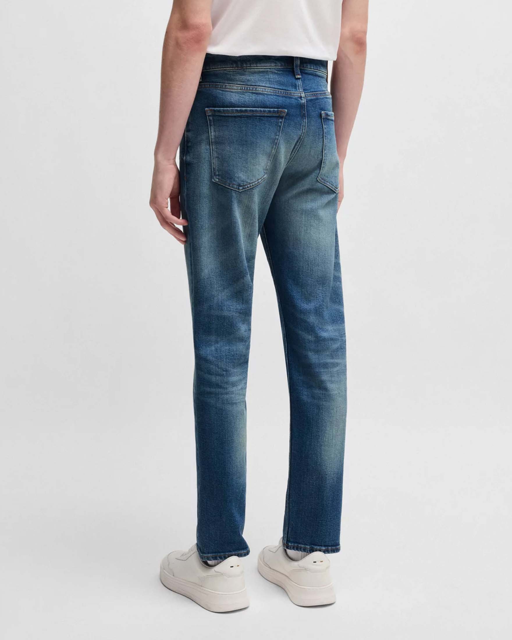 Jeans Delaware slim fit in cotone stretch lavaggio medio stone washed con baffature image