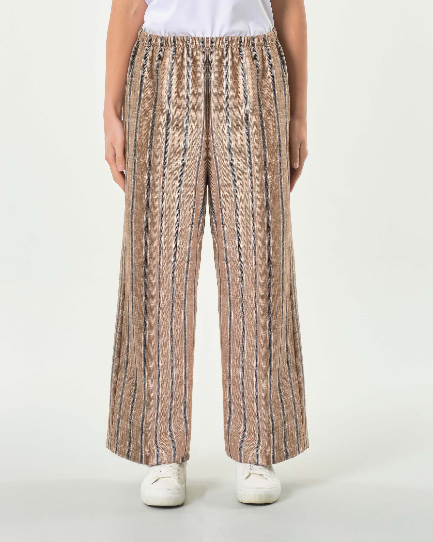 Pantaloni wide in cotone a fantasia a righe verticali in denim blu con elastico in vita image