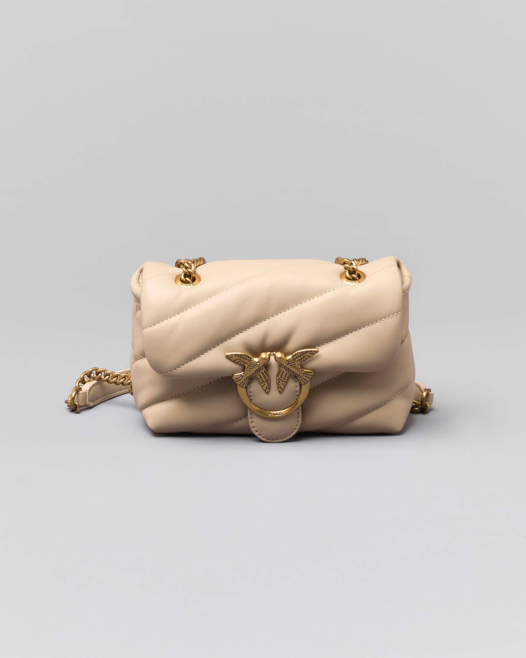 Baby Love Puff Bag in pelle beige lavorazione quilted e tracolla a catena dorata con fibbia Love Birds