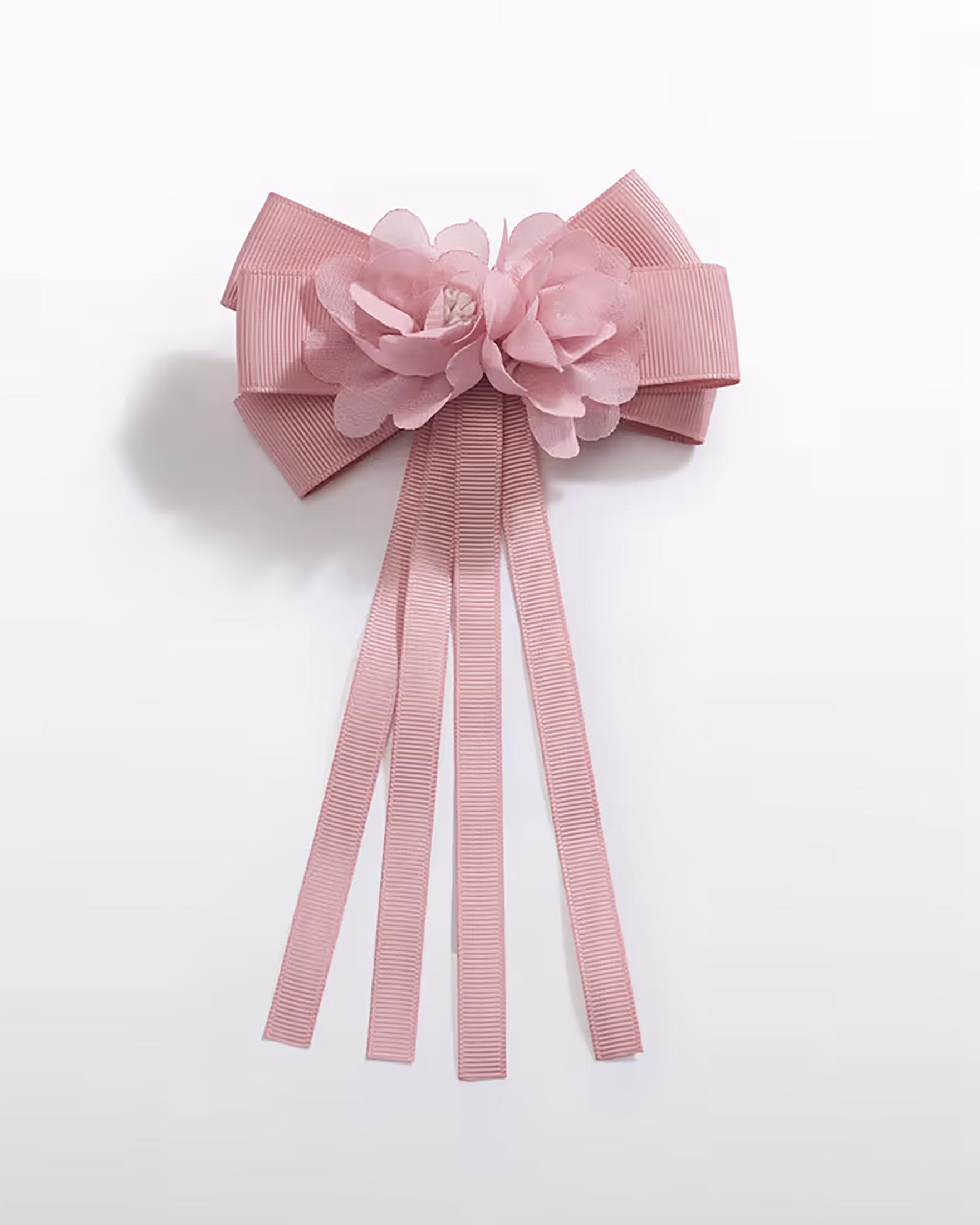 Molletta con fiocco e fiore rosa applicato