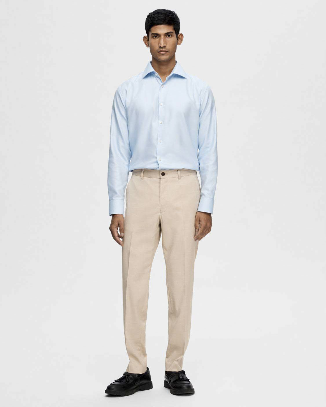 Pantaloni Cedric color sabbia slim-fit in tessuto armaturato di misto viscosa stretch con piega stirata