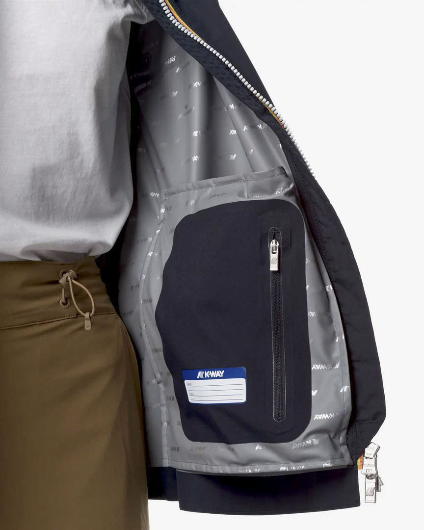 Giubbino K-way Marguerite midi blu con cappuccio e colletto alto