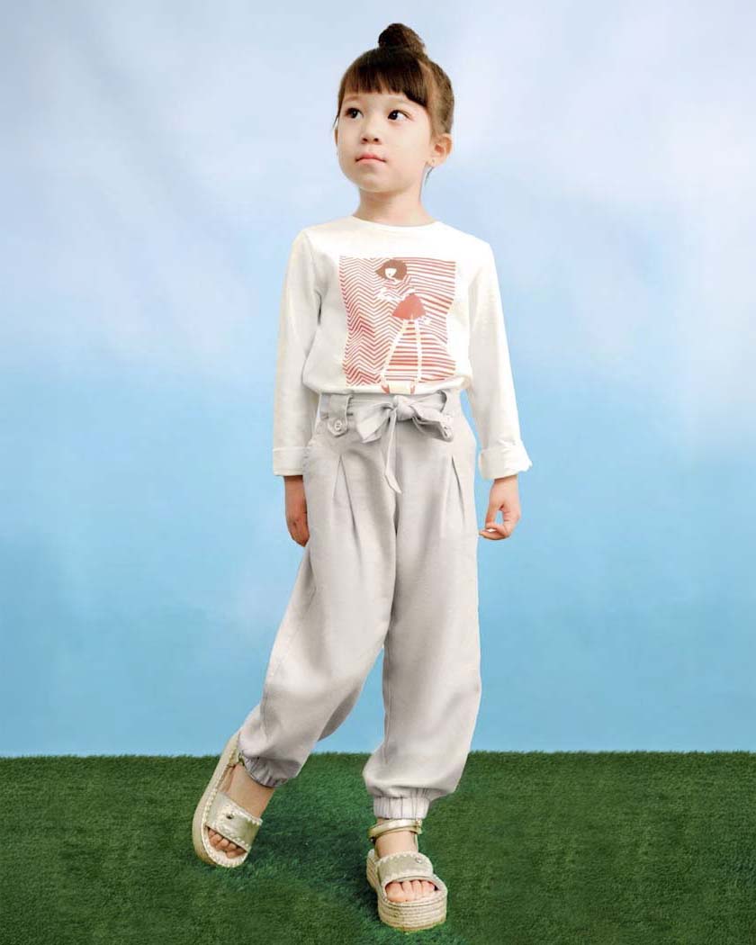 Pantalone beige in leggero tessuto di misto cotone e lyocell con fiocco
