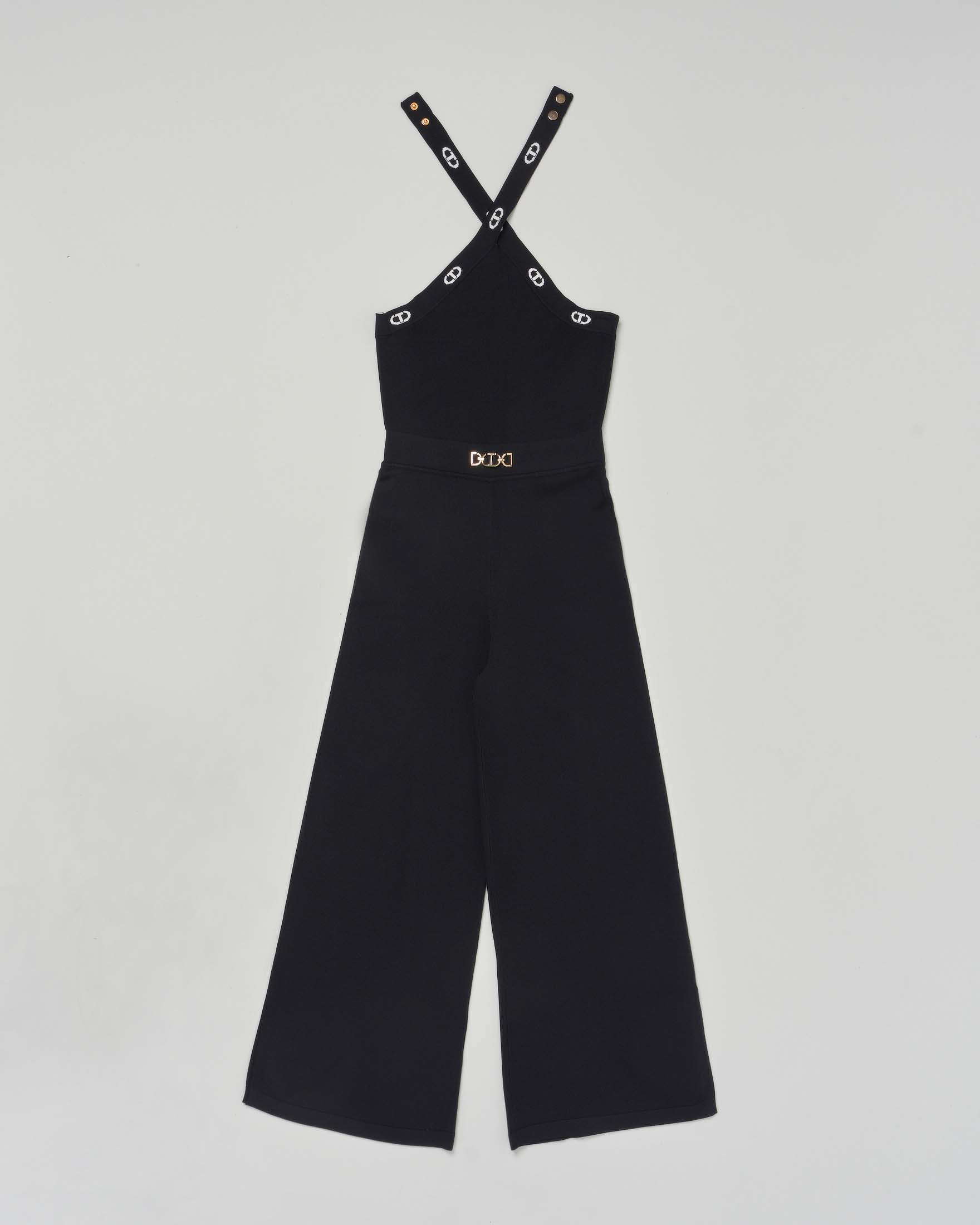 Tuta nera in maglia con Oval T in metallo dorato in vita