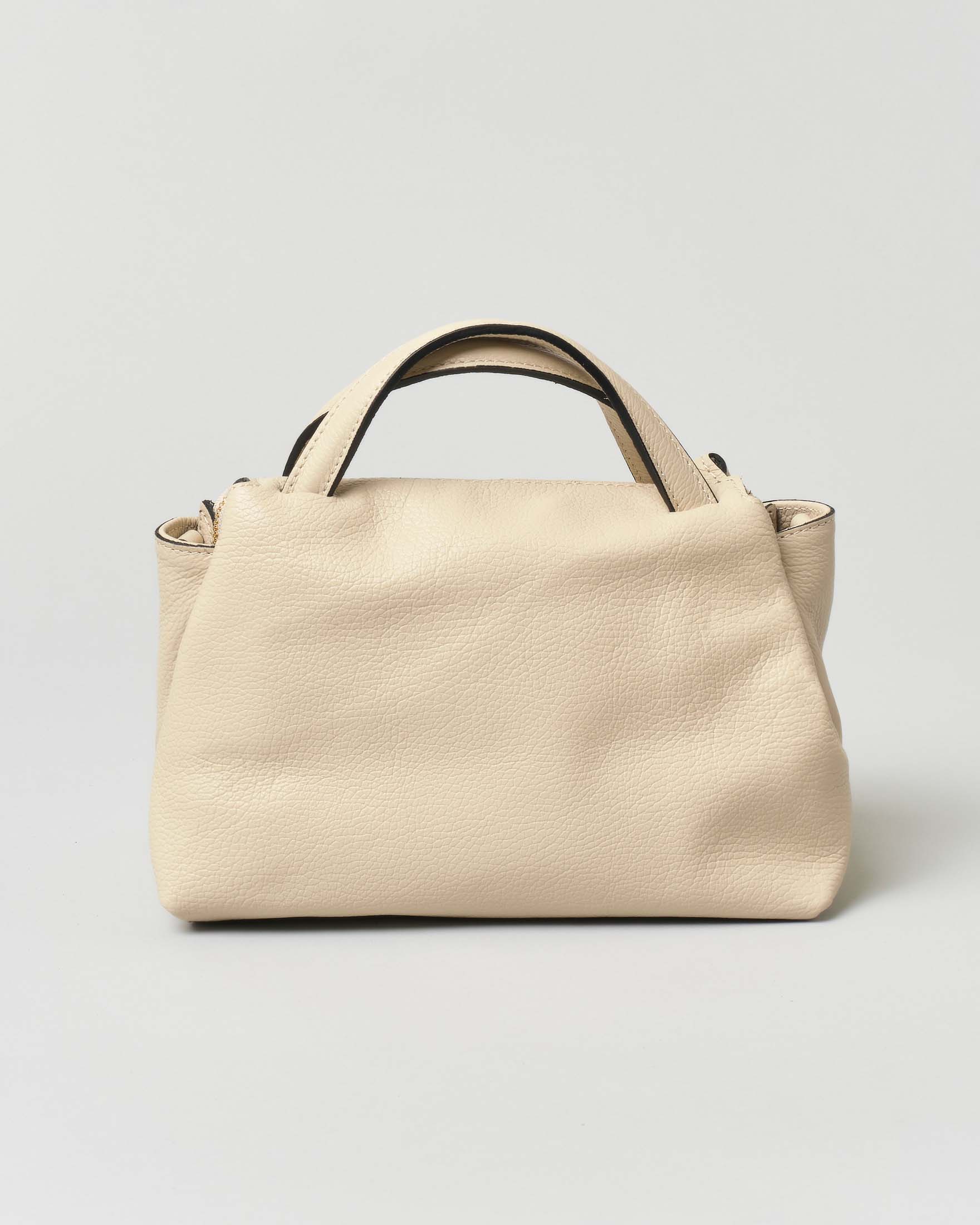 Borsa a mano piccola in pelle morbida effetto martellato color panna con tracolla più lunga rimovibile