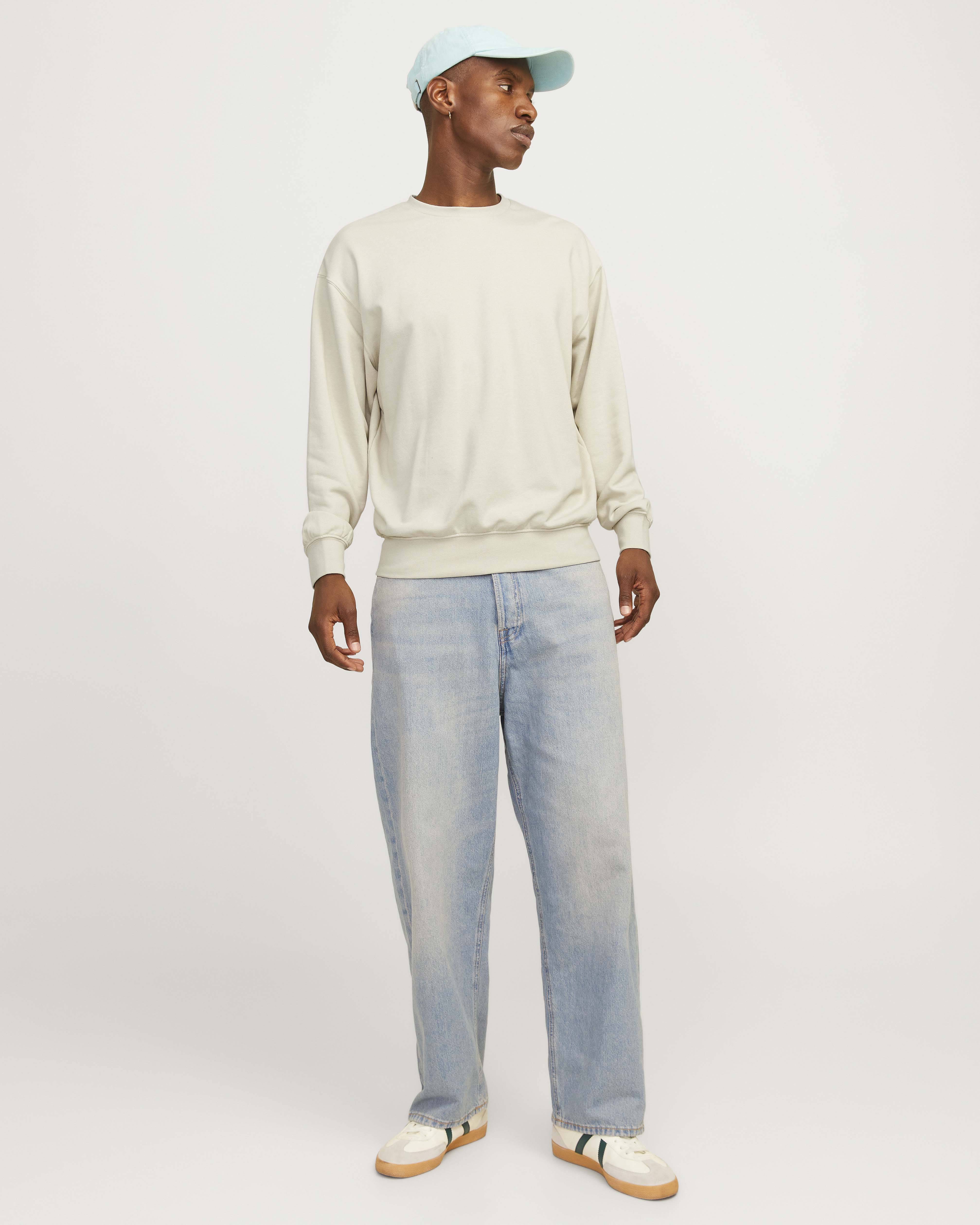 Felpa girocollo avorio loose-fit in cotone con spalle scese