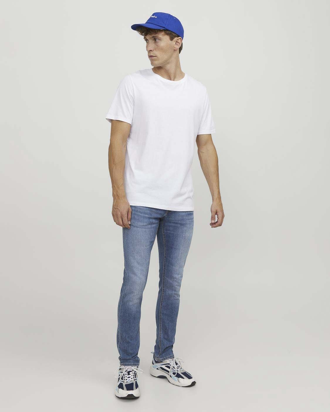 Jeans slim a vita bassa in cotone stretch lavaggio chiaro stone washed con baffature e sabbiature