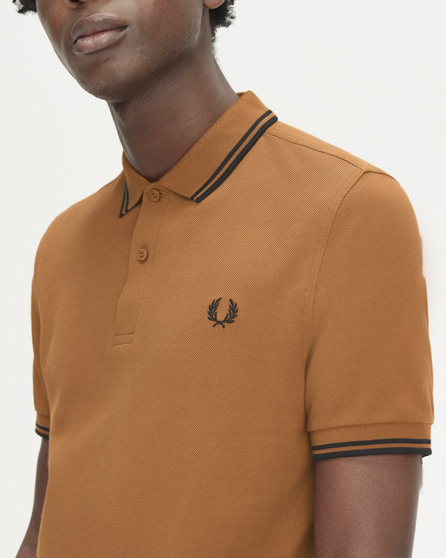 Polo arancione mezza manica con bordino nero image