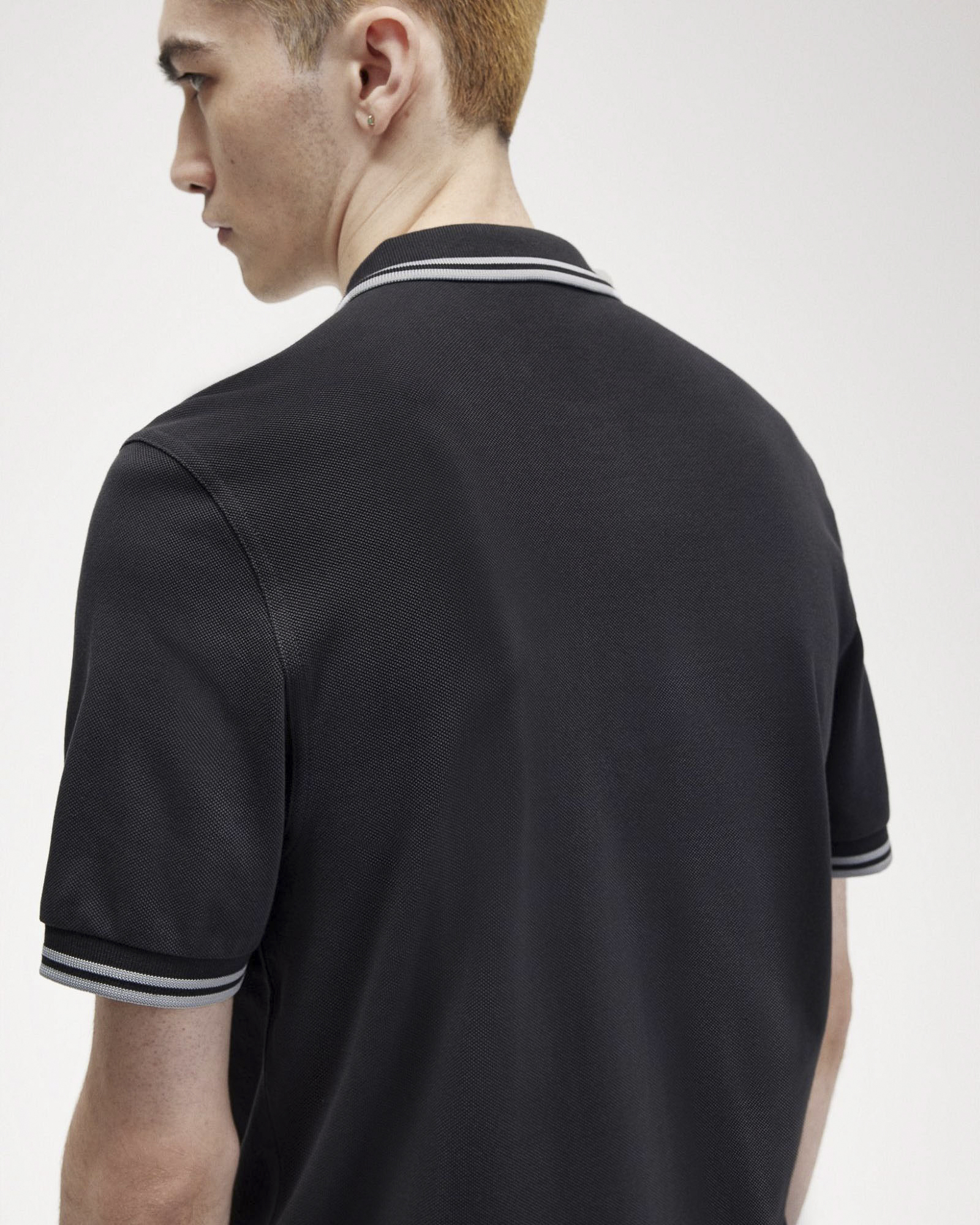 Polo grigio antracite mezza manica con bordino grigio image