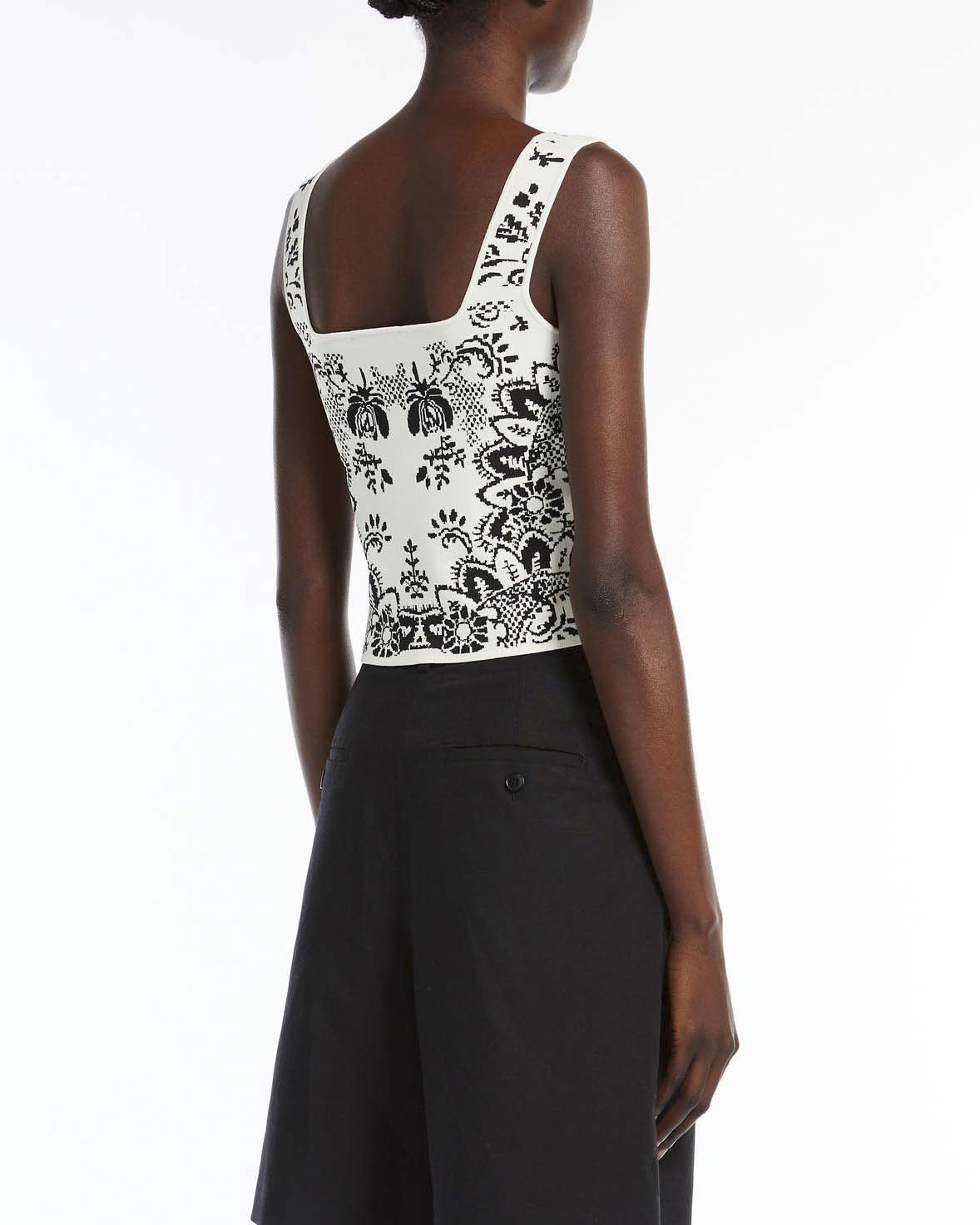 Top avorio senza maniche in maglia di misto viscosa con motivo jacquard nero