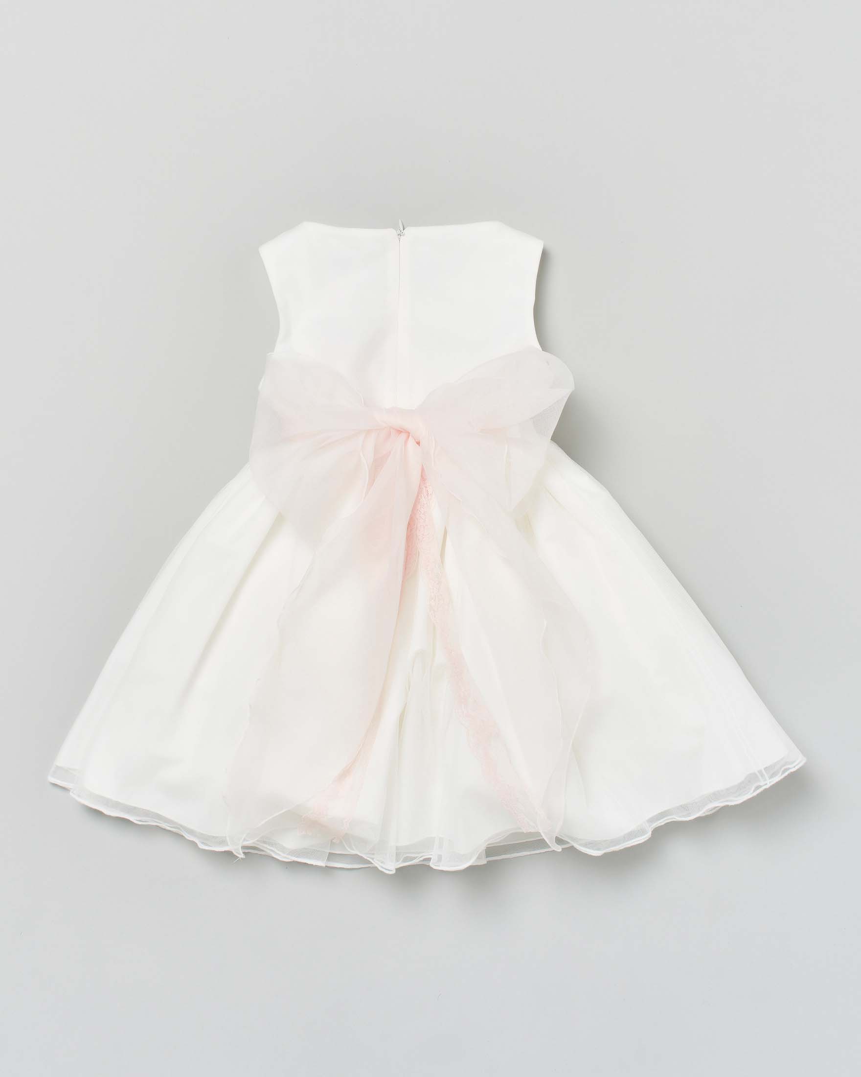 Abito avorio in tulle con gonna ampia fascia a fiori e maxi fiocco