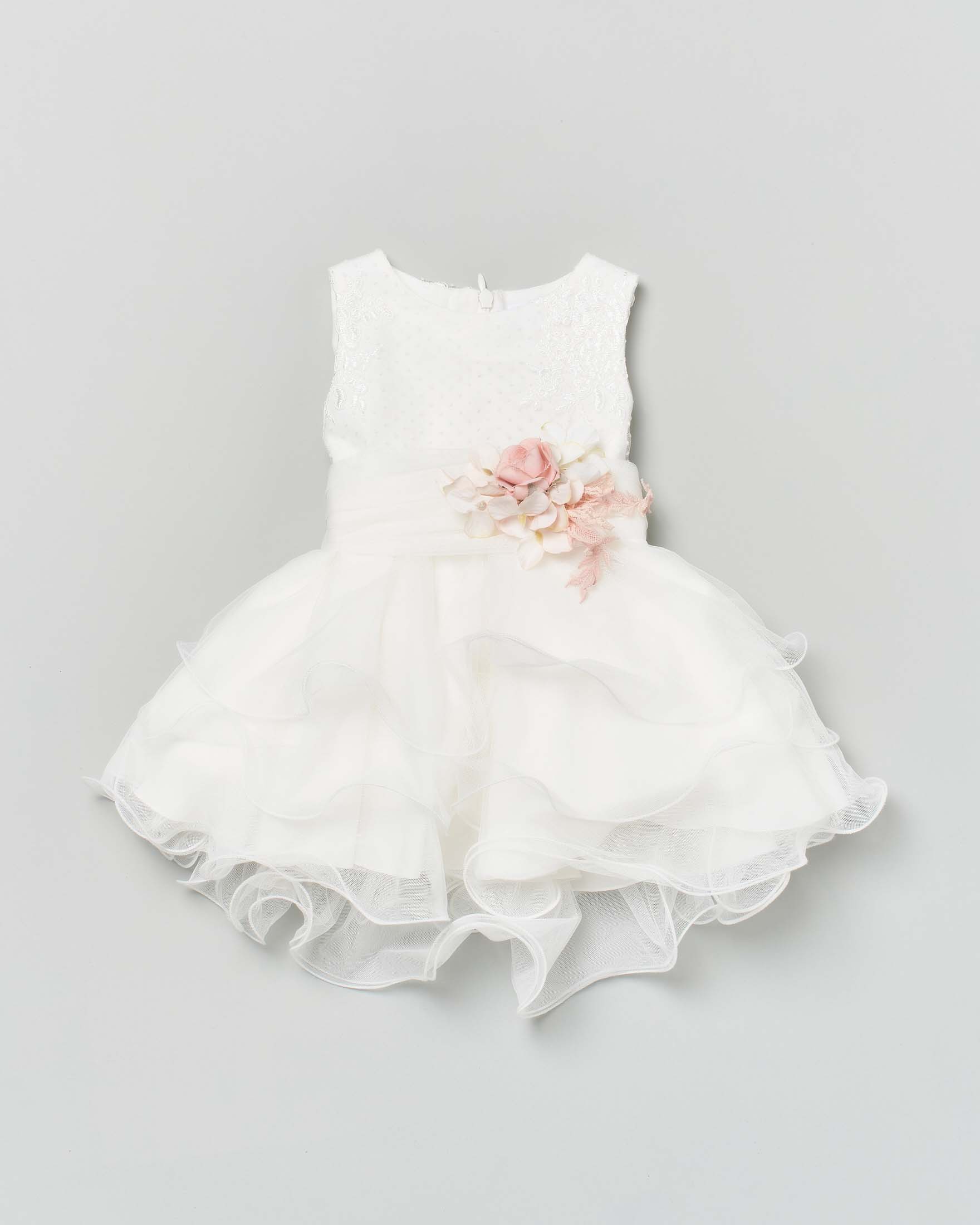 Abito avorio con gonna in tulle ad onde e fascia a fiori